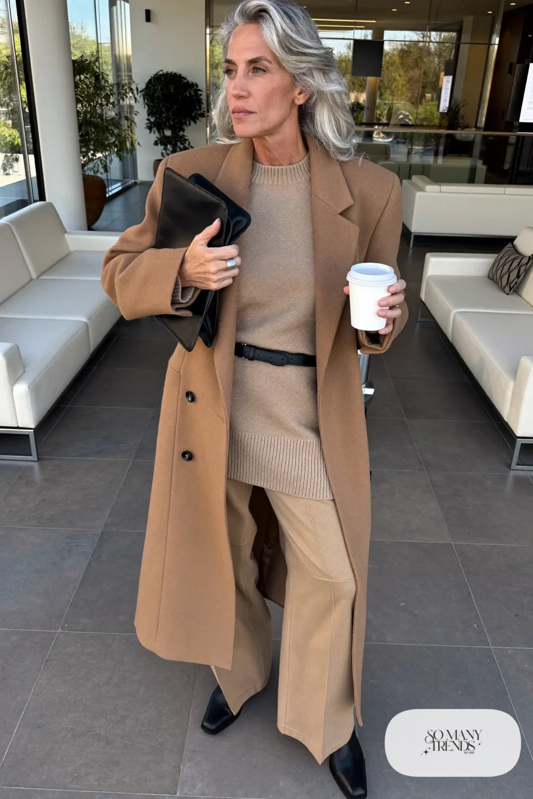 camel long wool coat camel knit sweater camel wide-leg pants black ankle boots black belt black leather bag office outfit 35