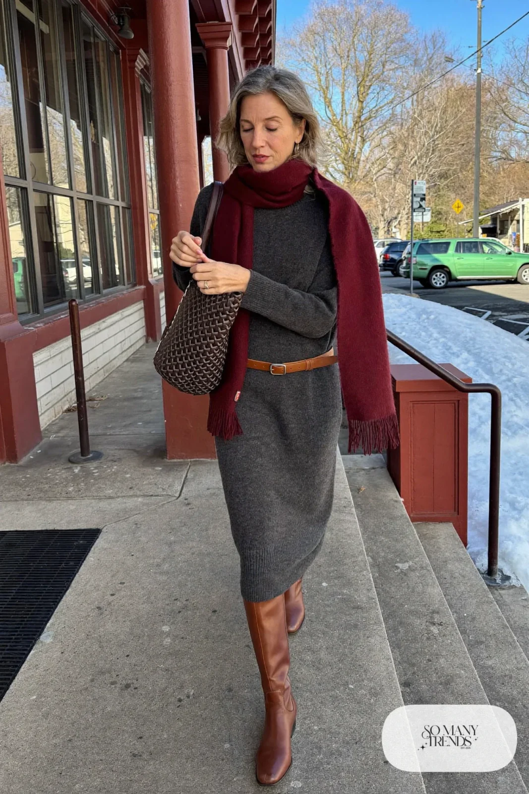 woman over 60 in gray midi sweater dress tall brown leather boots brown belt burgundy scarf outfit 10