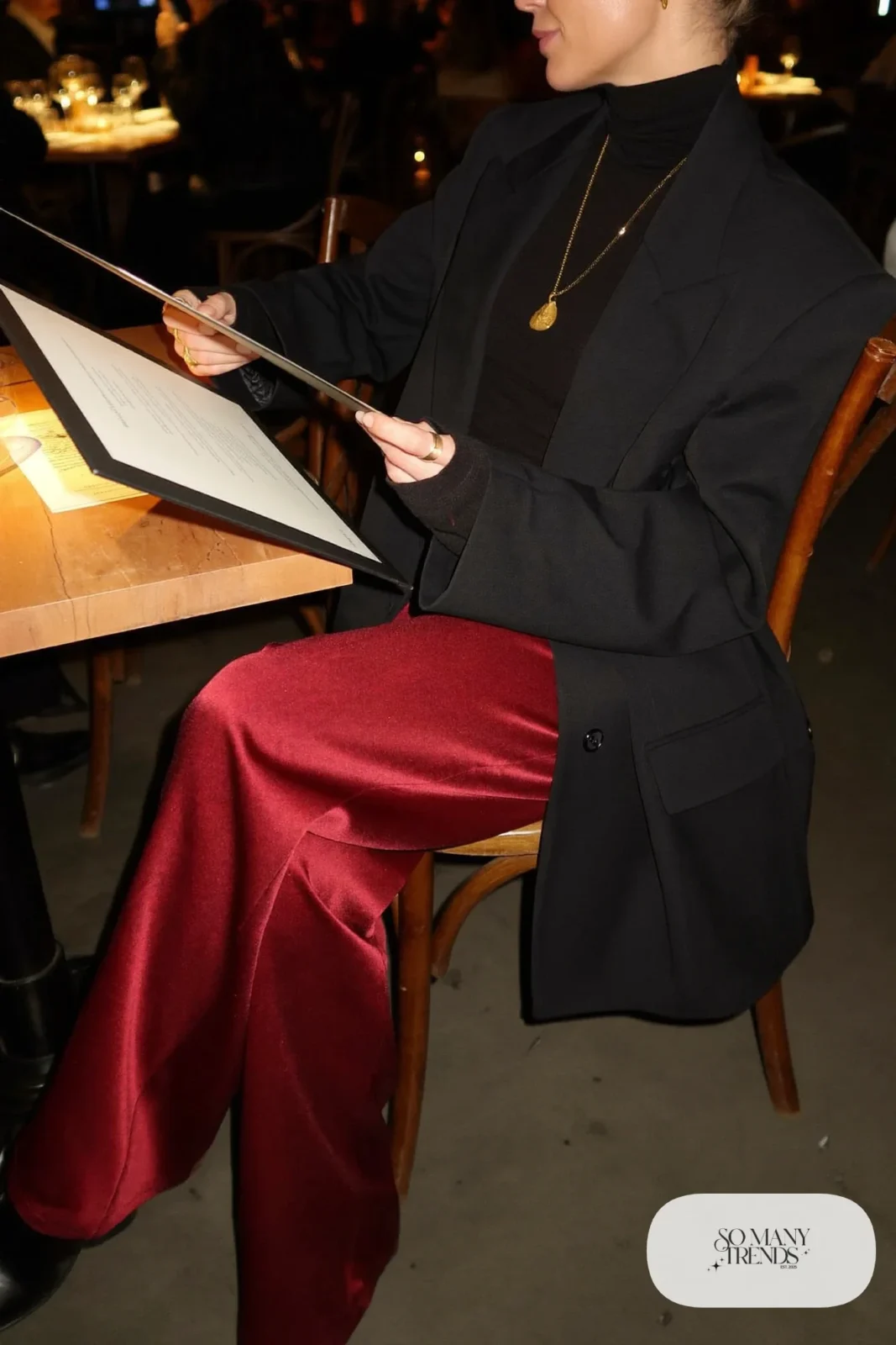 burgundy satin wide leg pants black merino turtleneck black blazer black pointed boots gold necklace outfit 20