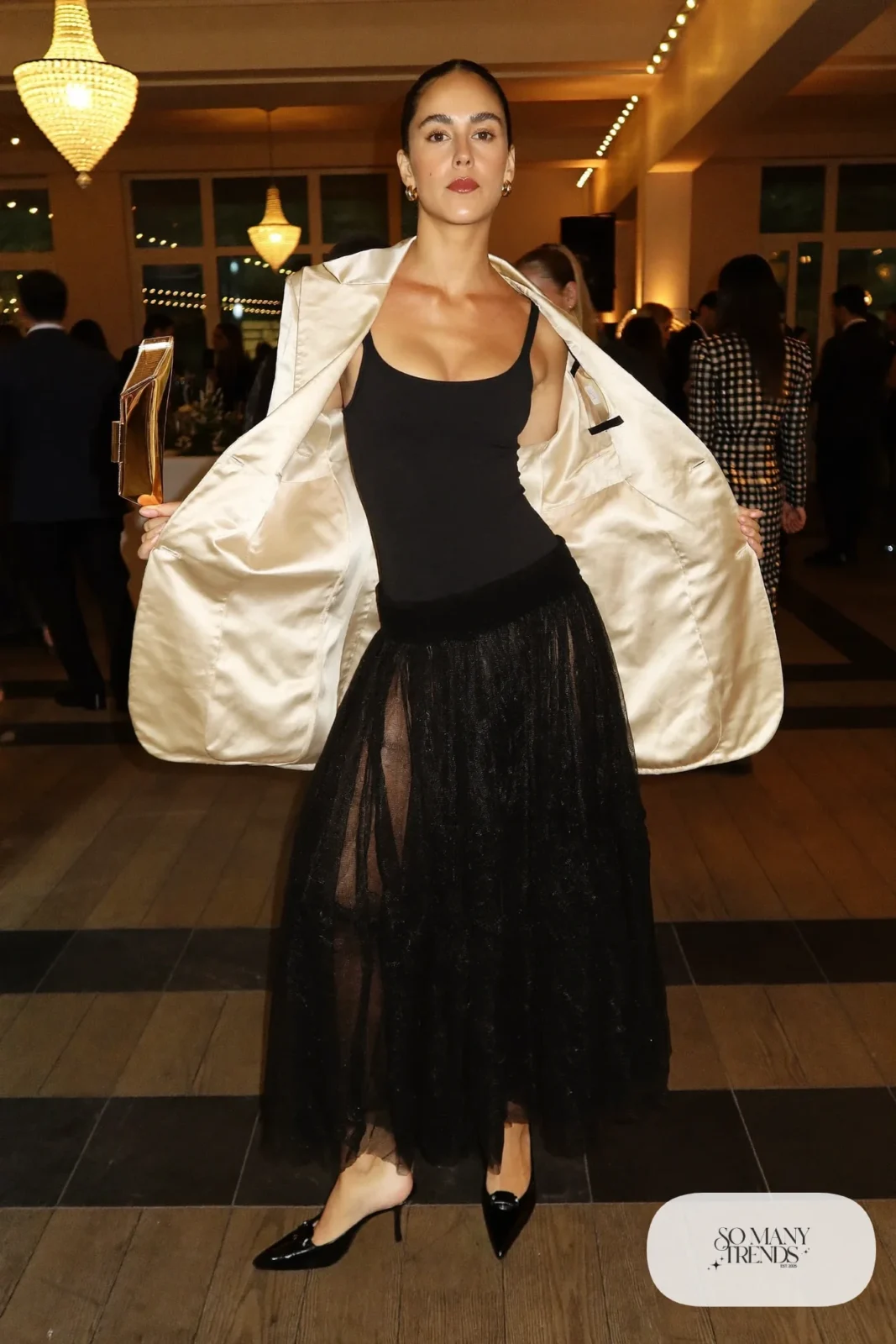 black tulle midi skirt black bodysuit champagne satin oversized blazer black pumps metallic clutch outfit 22
