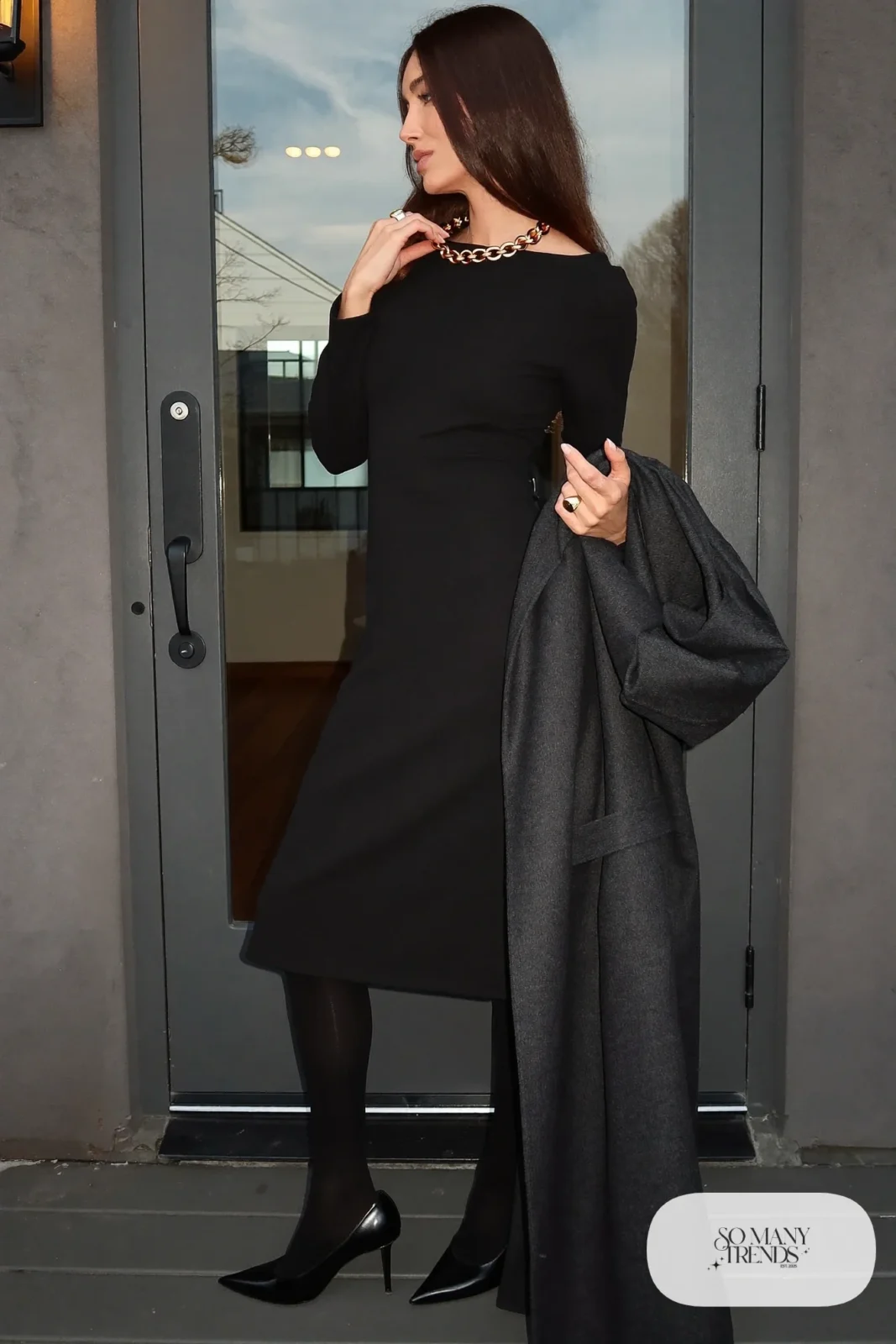black wool crepe midi dress chunky gold necklace black tights black pointed pumps long wool coat outfit 30