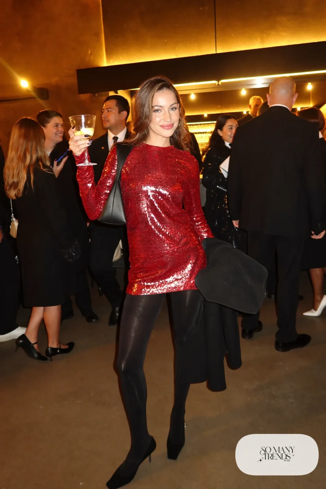 red sequin long sleeve mini dress black tights black ankle strap pumps black wool coat outfit 3