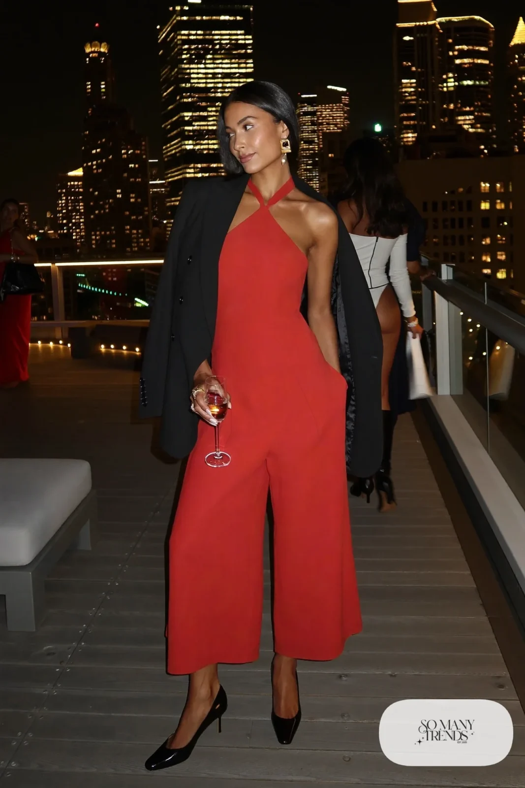 cherry red halter wide leg jumpsuit black blazer black pumps gold earrings outfit 19