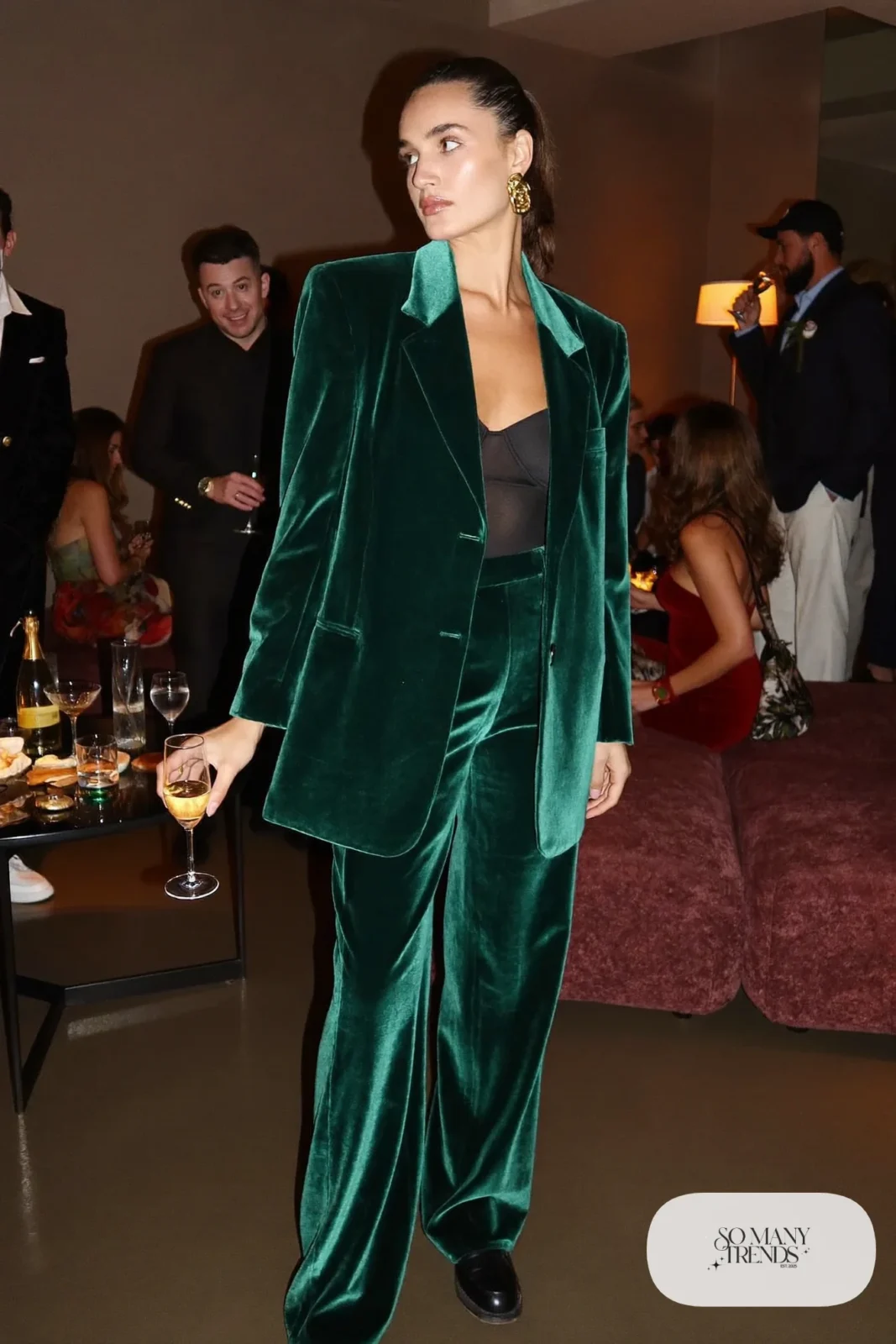 deep green velvet blazer pants set black bodysuit black loafers gold earrings outfit 31