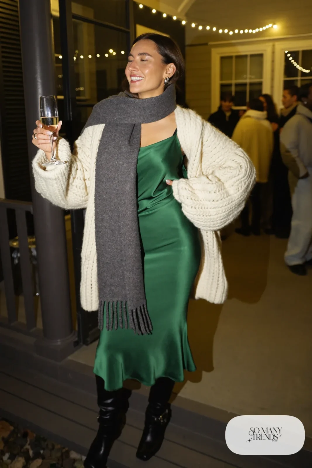 emerald satin midi slip dress oversized cream cardigan wool scarf tall black boots outfit 3