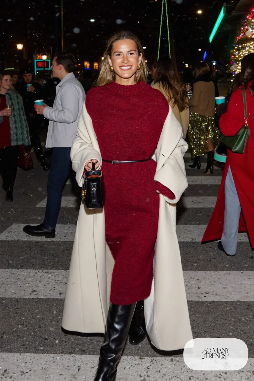 burgundy knit sweater midi dress thin belt tall black boots cream long coat gold hoops outfit 19