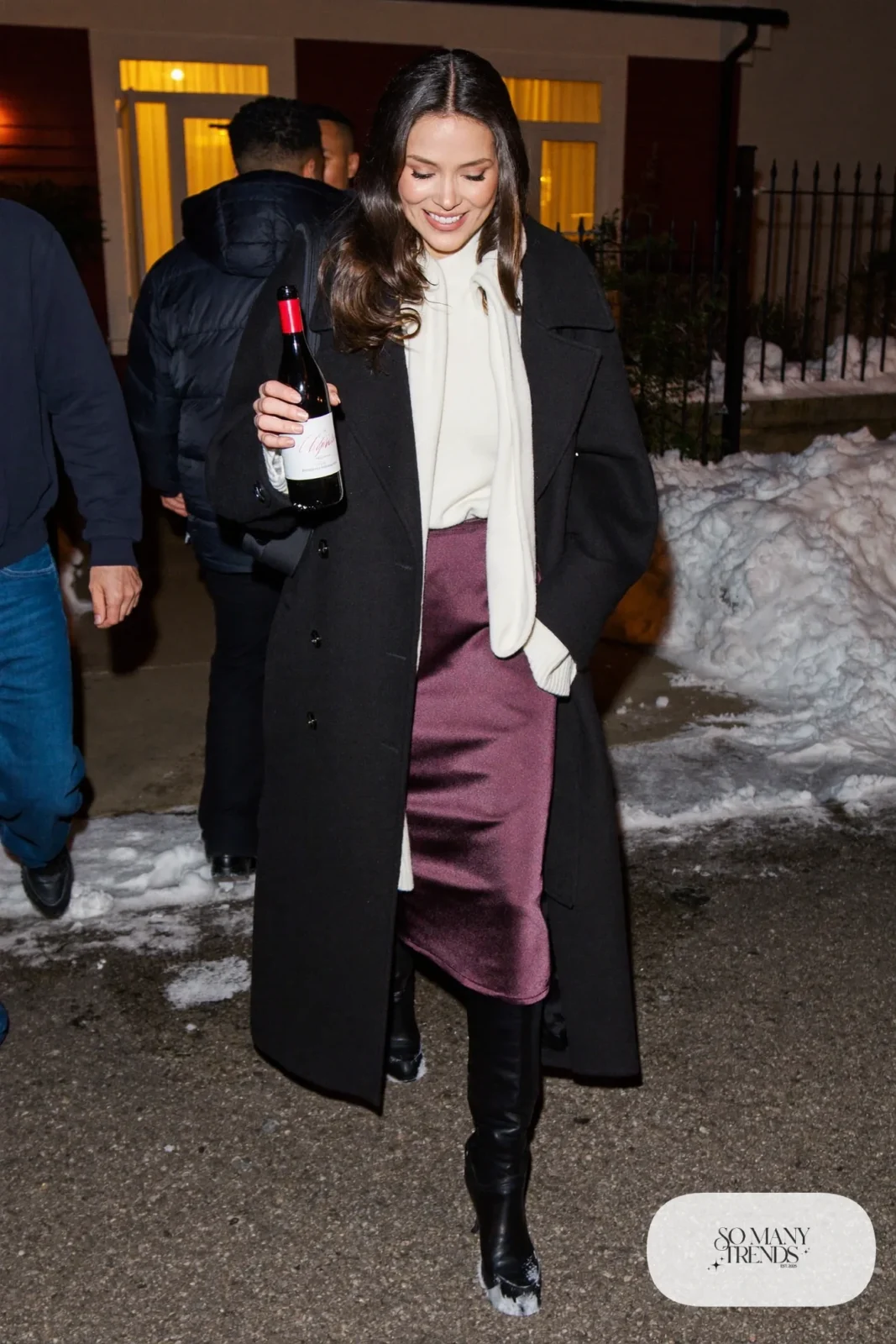 plum satin midi skirt oversized cream sweater long black coat tall black boots wool tights outfit 26