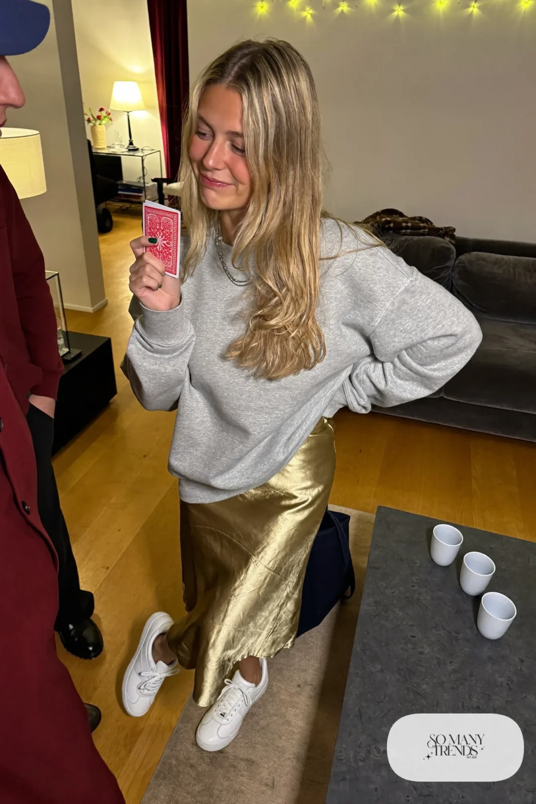 champagne gold lamé midi skirt boxy gray crewneck sweatshirt white sneakers outfit 9