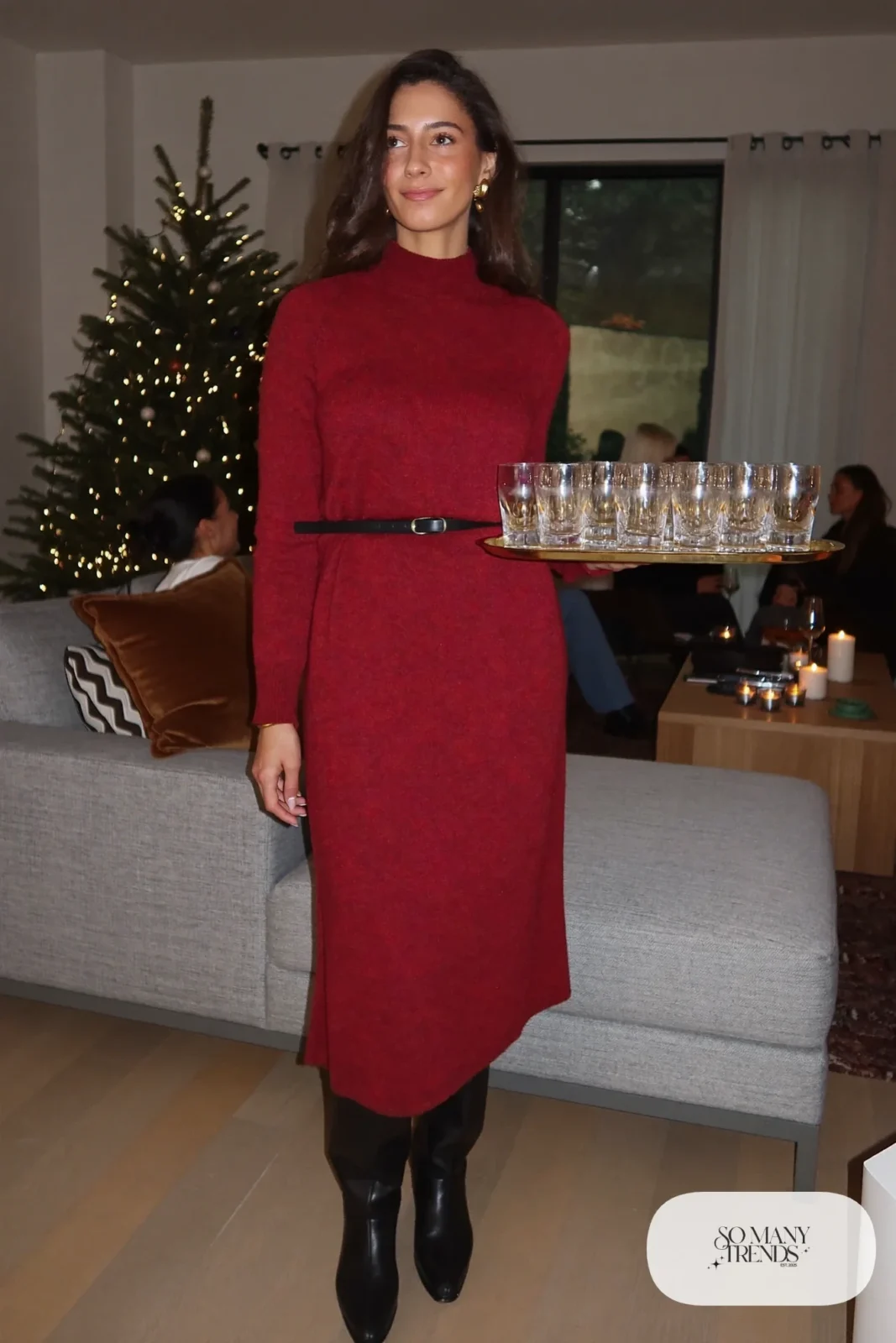 deep red relaxed knit sweater dress tall black boots thin black belt gold earrings outfit 12
