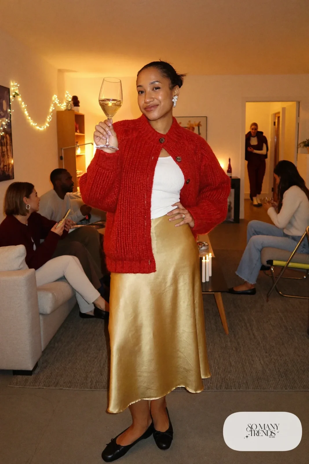 cherry red knit cardigan white tank champagne satin slip skirt pearl earrings black flats outfit 15