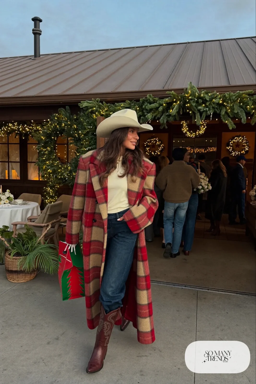 cream felt cowboy hat long camel red plaid coat dark jeans brown boots outfit 17