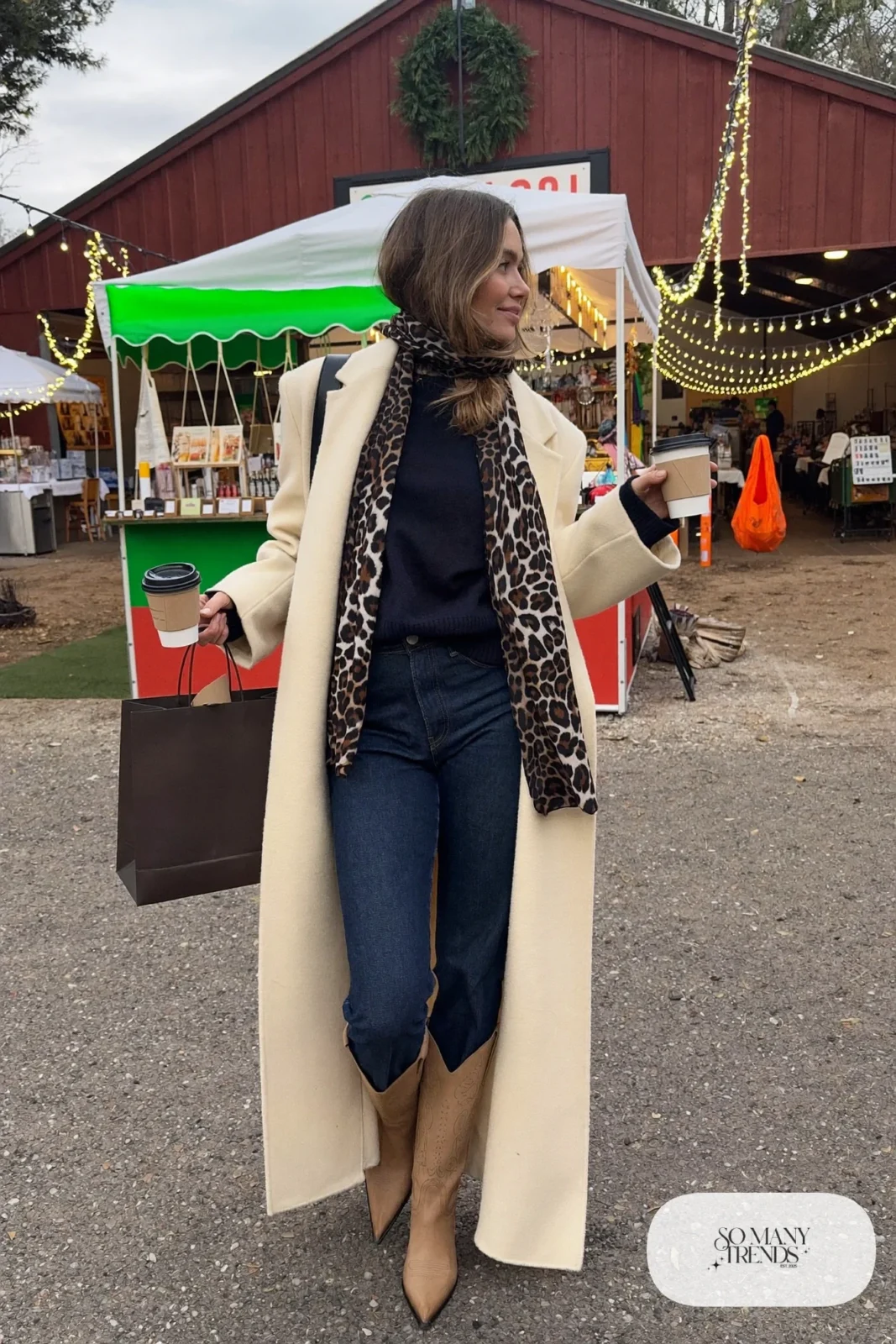 long cream wool coat leopard print scarf dark jeans tan cowboy boots outfit 26