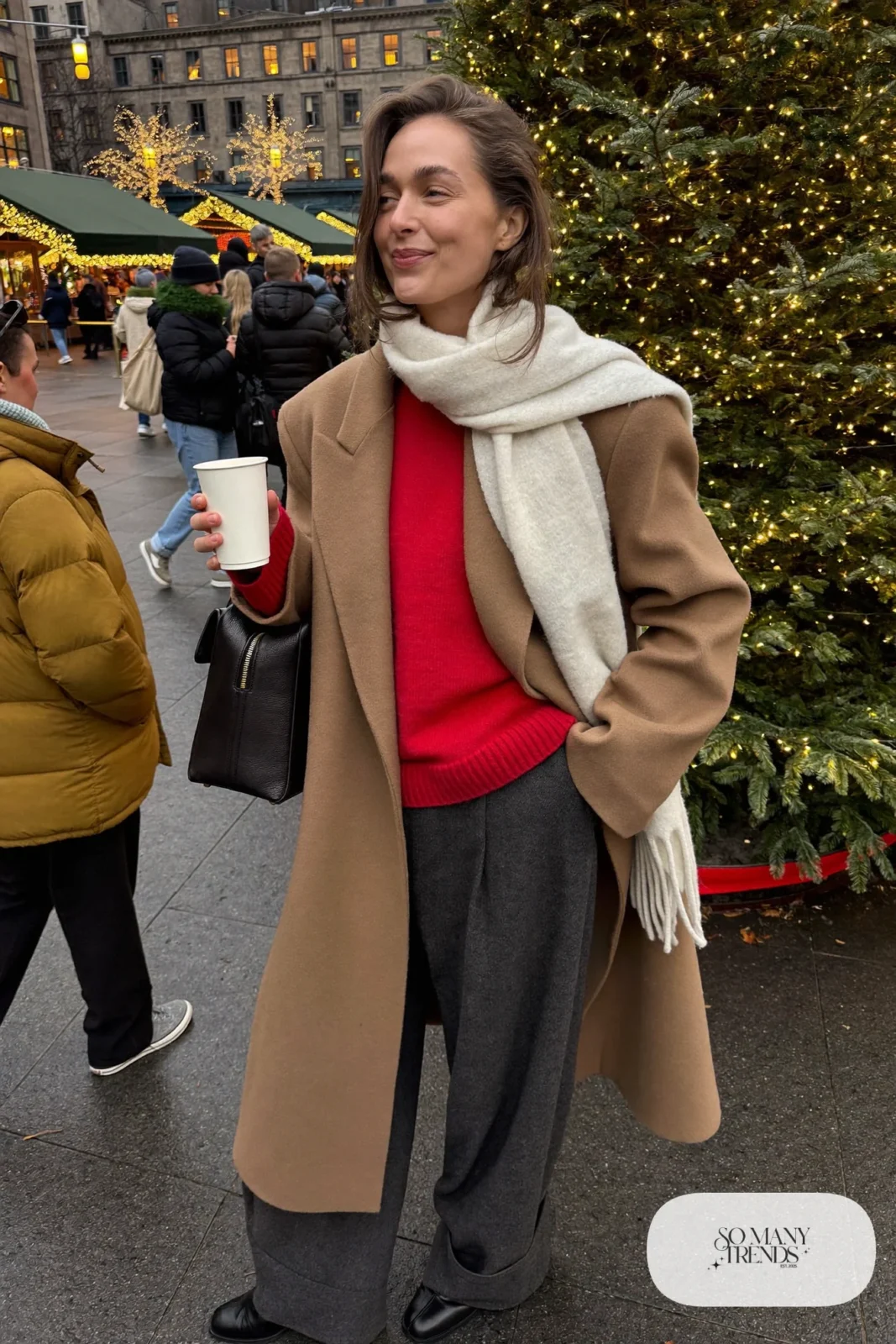 oversized camel wool coat cranberry knit sweater charcoal wide-leg pants black ankle boots cream scarf outfit 1