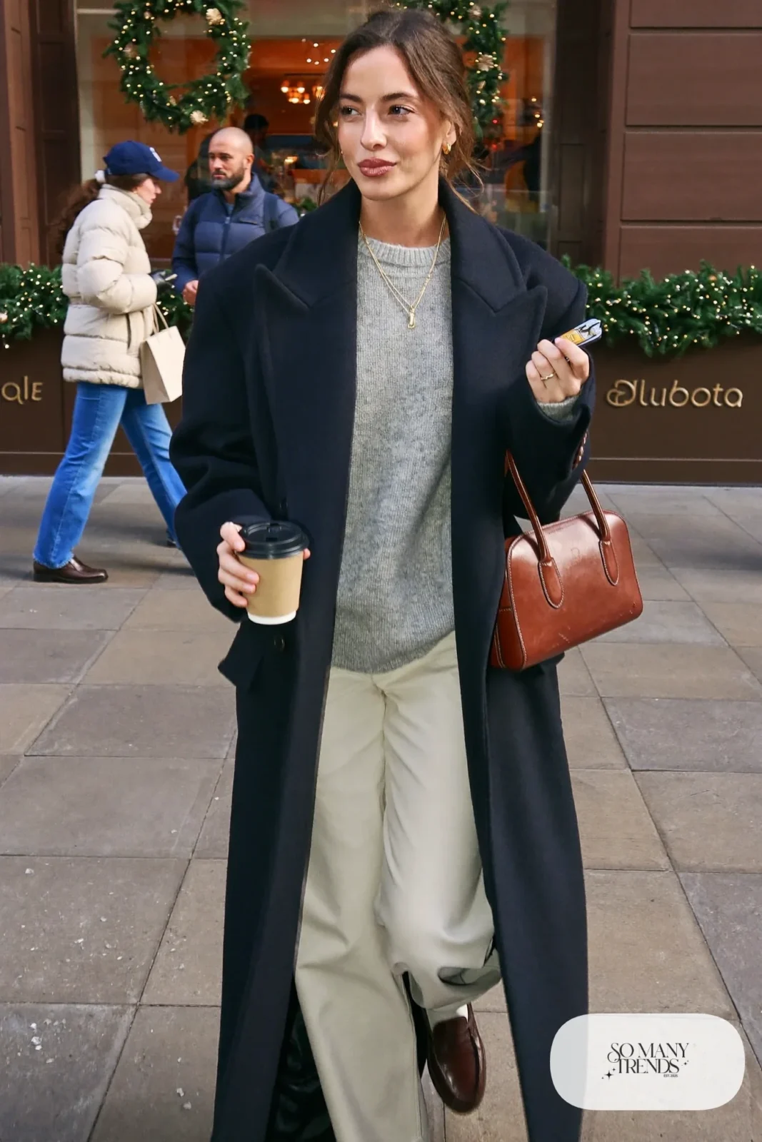 oversized navy wool coat heather gray knit sweater cream wide-leg pants brown loafers gold necklaces outfit 5