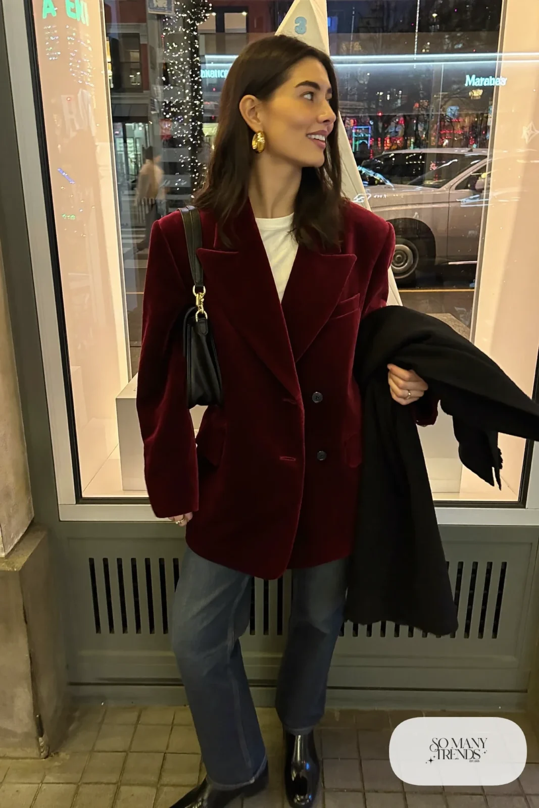 oversized burgundy velvet blazer white tee dark straight jeans black wool coat black ankle boots gold hoops outfit 14