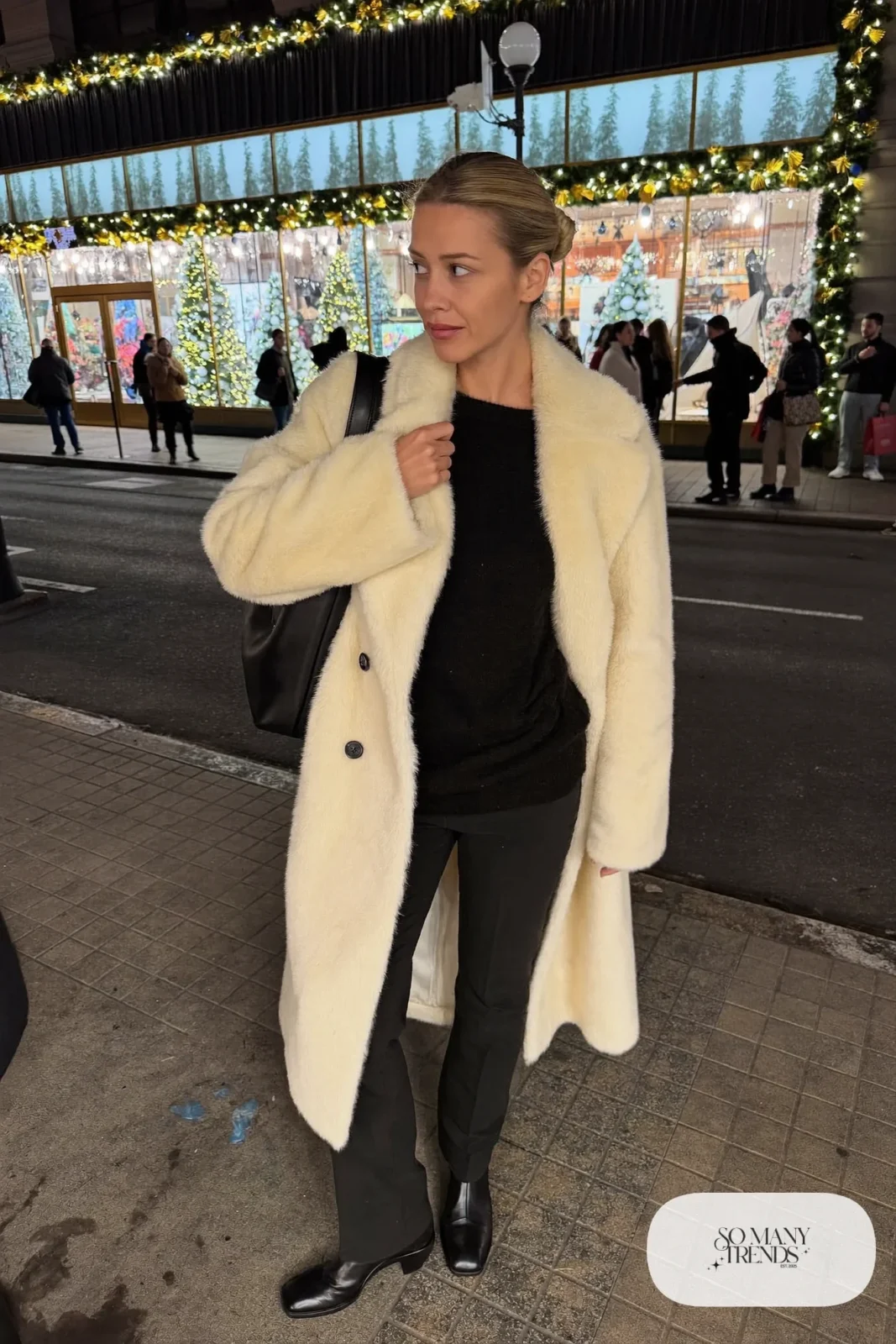 oversized ivory faux fur coat black knit sweater black pants black leather boots black structured bag outfit 16