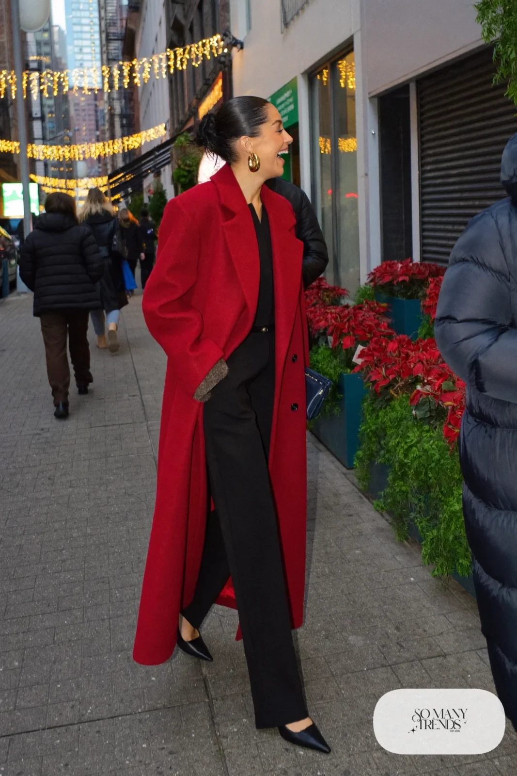 black wide-leg wool jumpsuit oversized red wool coat black pointed flats black clutch gold earrings outfit 22