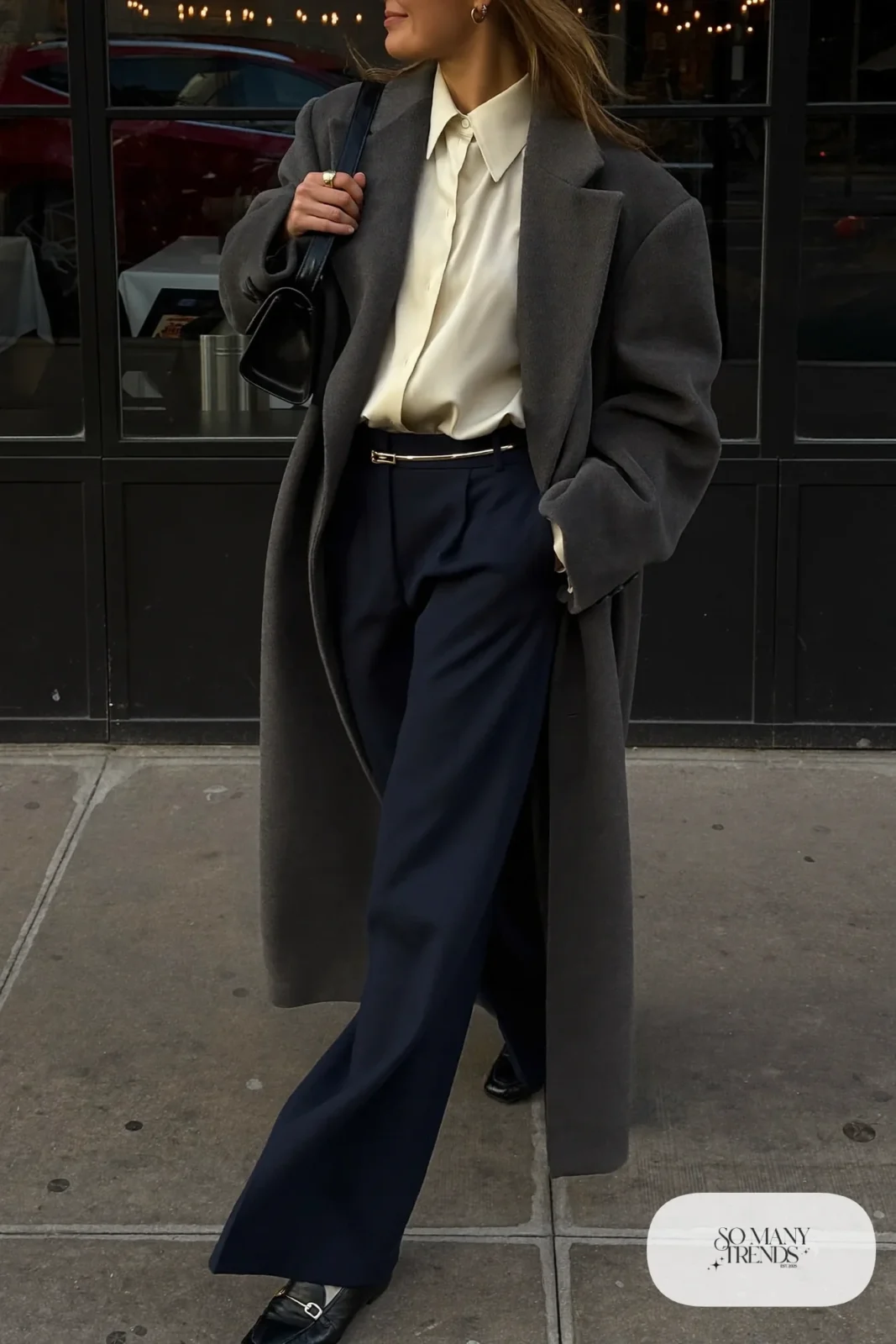 navy wide-leg wool pants cream silk blouse thin gold belt long charcoal coat black loafers outfit 24
