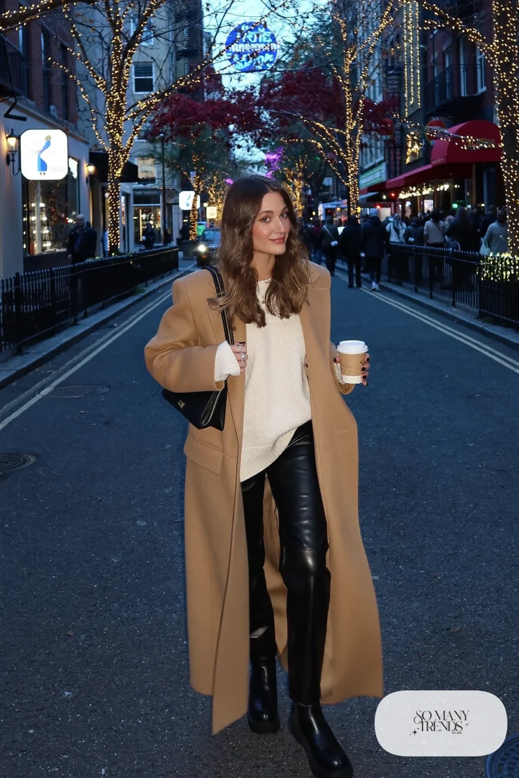 black straight-leg faux leather pants oversized cream sweater long camel shearling coat black boots outfit 26
