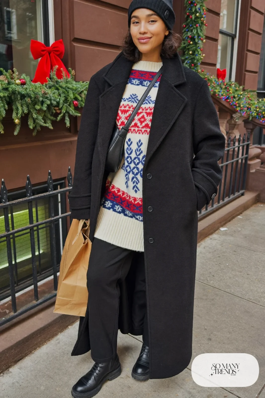 cream navy red Fair Isle sweater straight black pants long black coat lace-up boots black beanie outfit 29