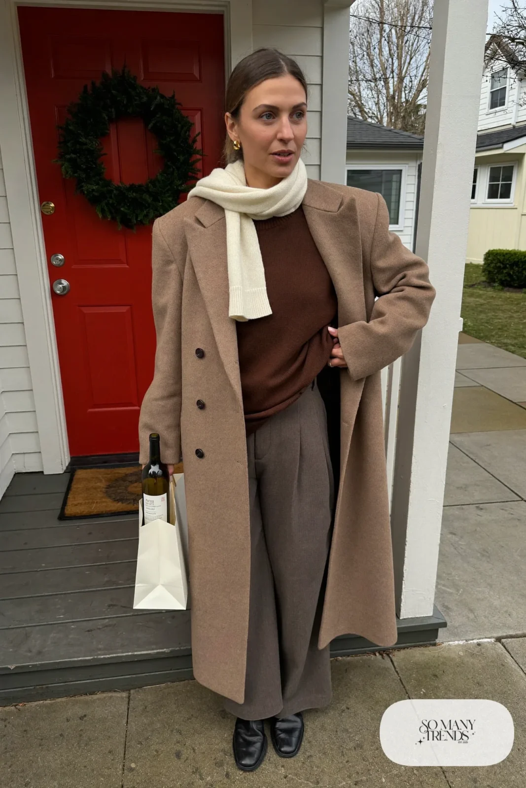 long camel wrap coat chocolate brown sweater gray wide-leg pants ankle boots holiday dinner outfit 2