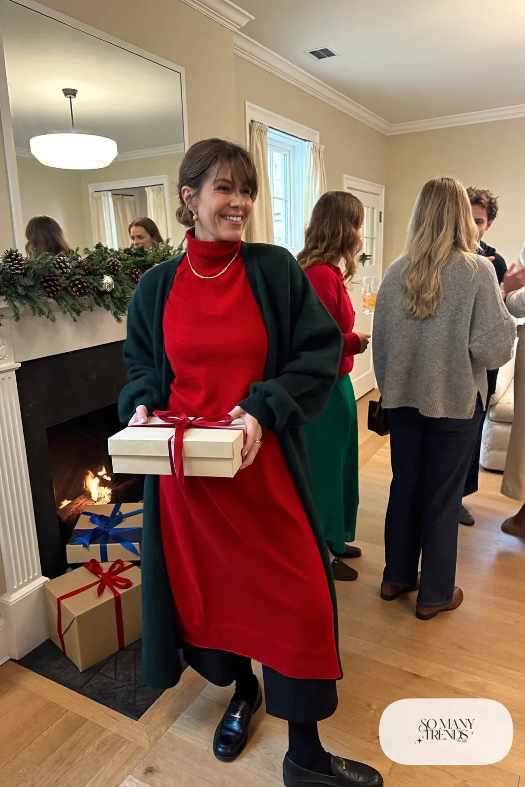 red turtleneck sweater black wide-leg pants long black cardigan black loafers gold chain outfit 12