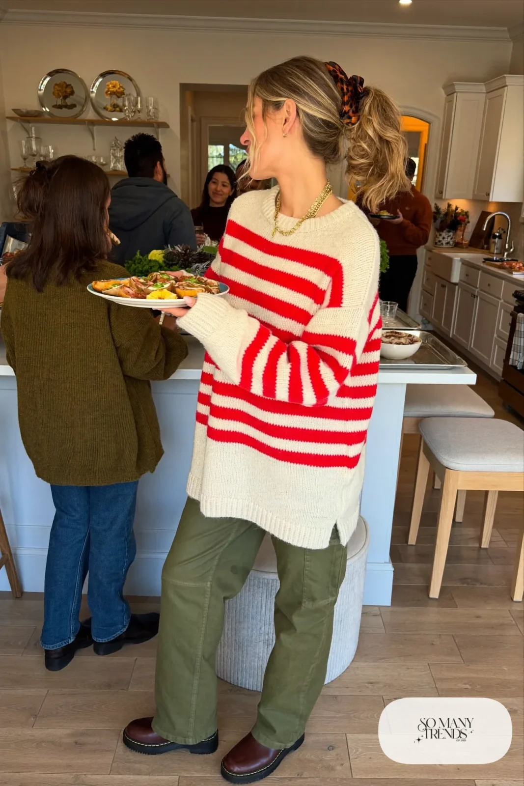cream red striped sweater olive cargo pants brown lug-sole boots gold necklace hair clip outfit 14