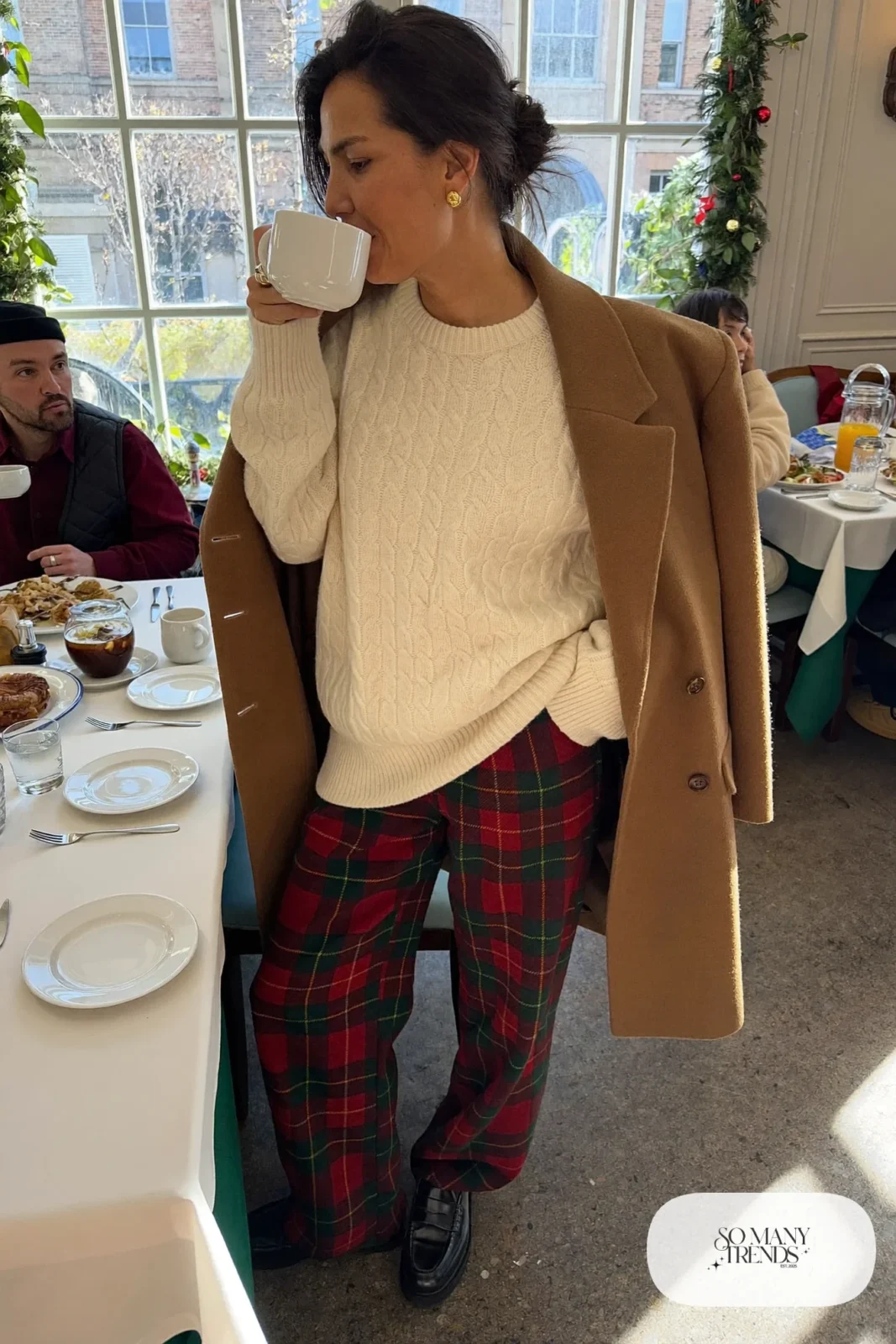 cream cable knit sweater red green plaid wide-leg pants black loafers camel coat brunch outfit 15