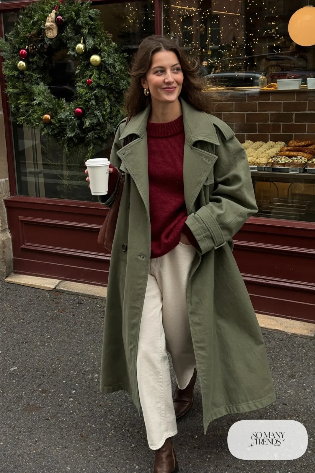 long olive trench coat burgundy sweater cream pants brown ankle boots leather tote brunch outfit 21
