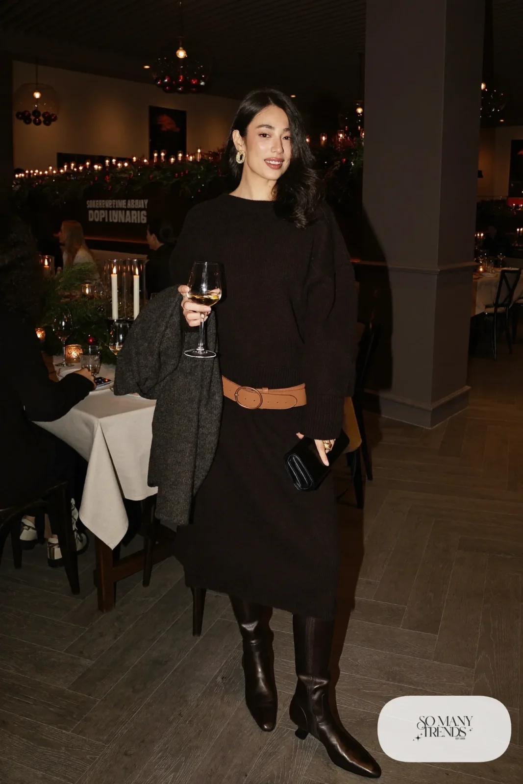 black knit midi sweater dress wide tan leather belt knee-high black boots gold earrings office drinks outfit 28
