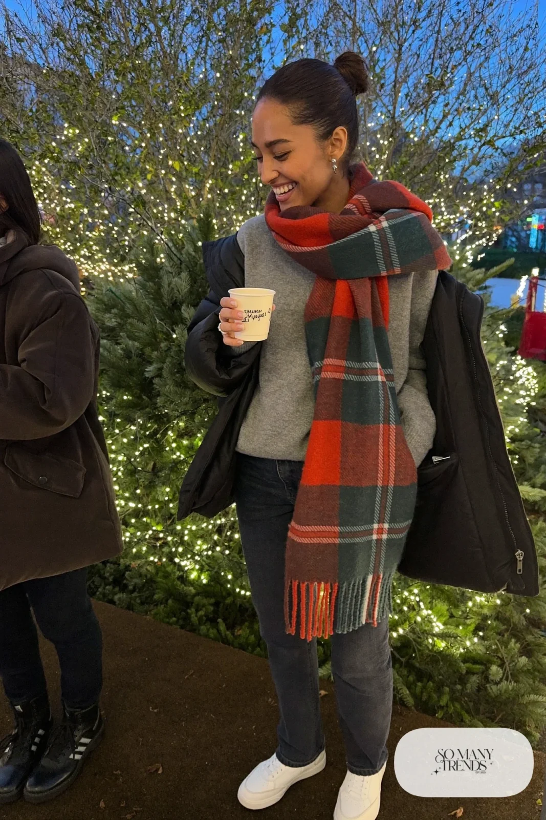 large red green tartan wool scarf gray sweater dark jeans white sneakers holiday outfit 29