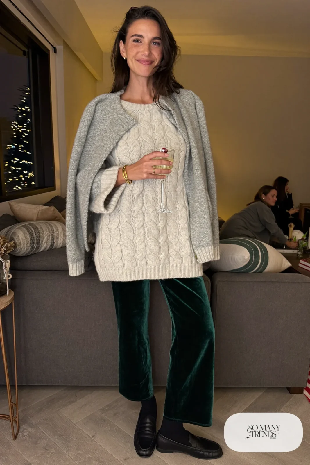 deep green velvet straight pants cream oversized knit sweater black loafers long gray cardigan holiday outfit 32
