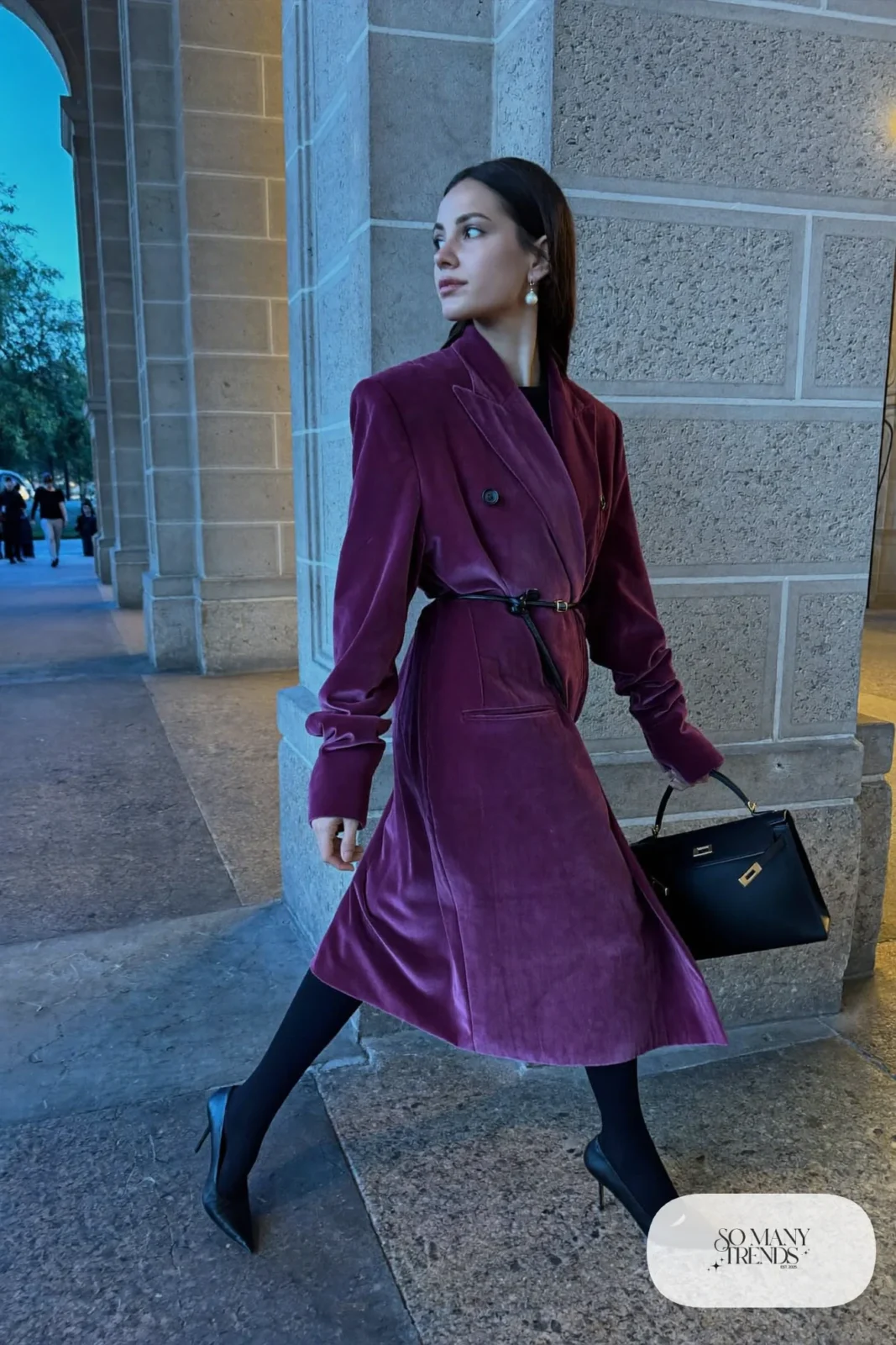 plum velvet long blazer dress belted with black pointed pumps and pearl earrings, formal winter outfit 4