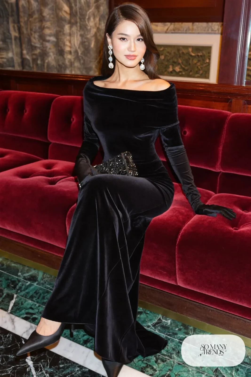 black velvet floor-length gown with long satin gloves, drop earrings and black heels, formal winter outfit 5