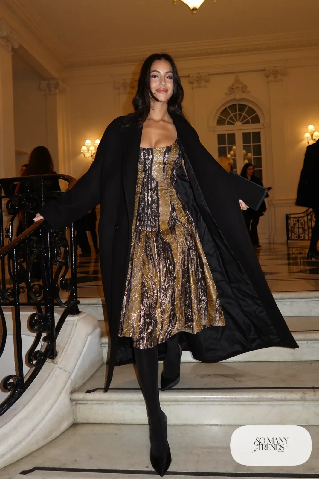 gold and black brocade midi dress with long black wool coat, sheer tights and black pumps, formal winter outfit 23