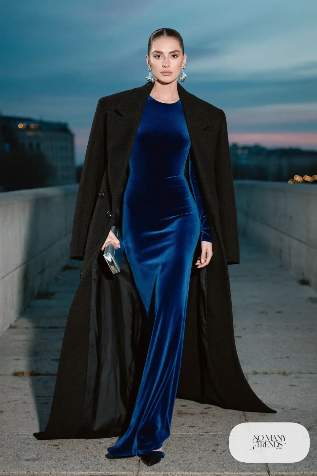 cobalt blue velvet floor-length gown with long black cape-coat, silver earrings and black closed-toe heels, formal winter outfit 27