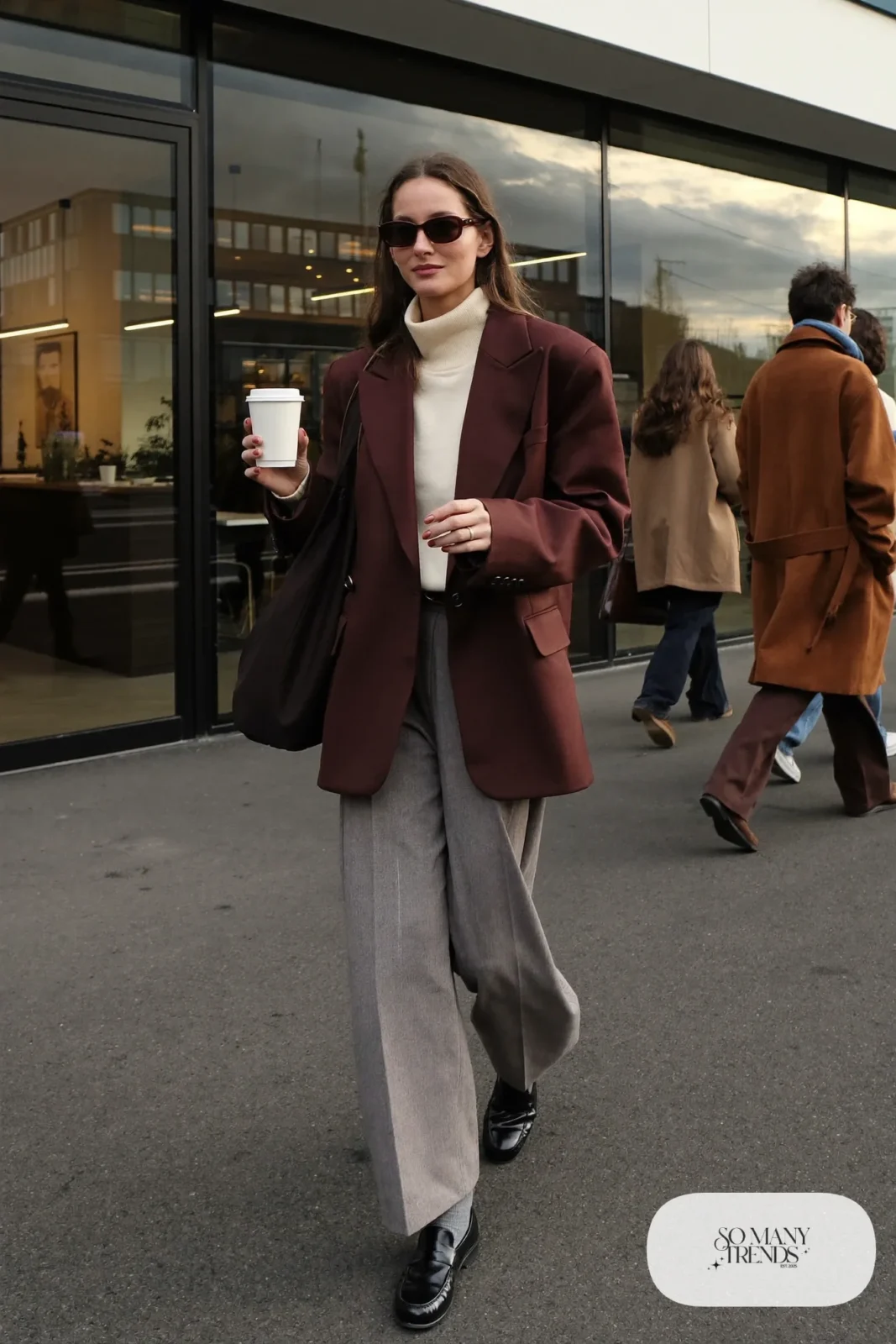 burgundy oversized blazer gray wide-leg pants cream turtleneck black loafers outfit 1