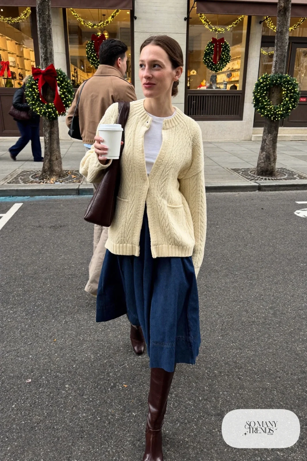 navy pleated midi skirt oatmeal chunky cardigan white tee knee-high brown boots outfit 5