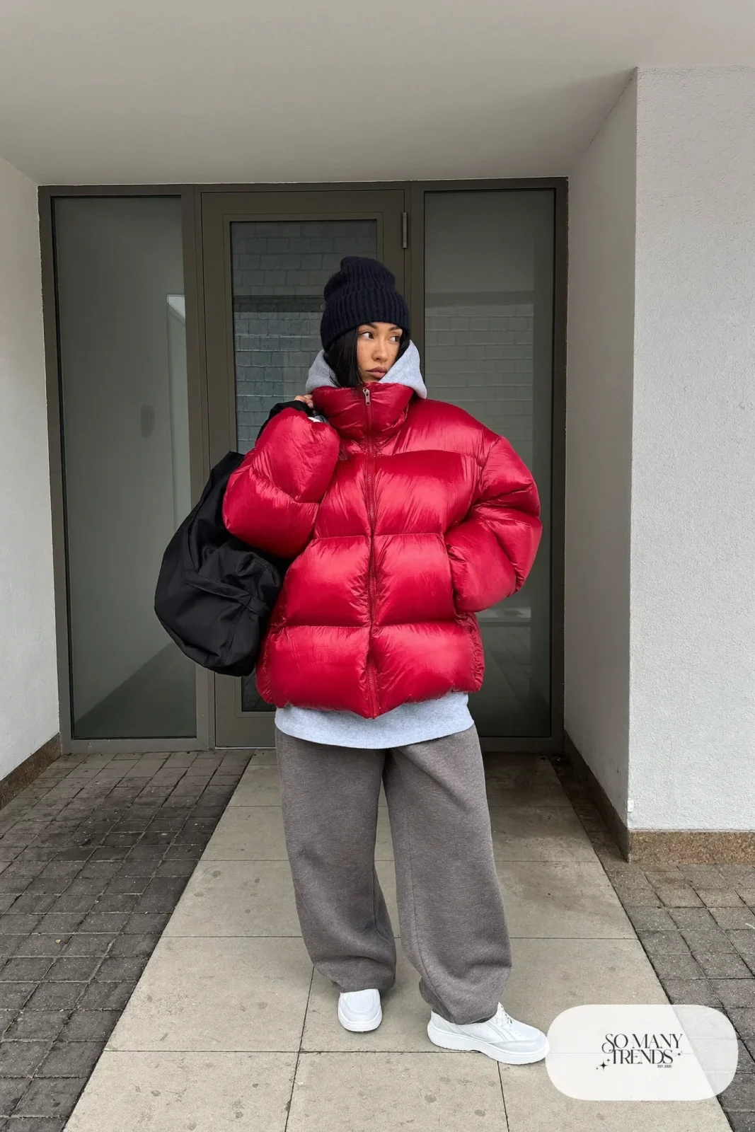 cherry red boxy puffer jacket gray oversized hoodie gray joggers white sneakers black beanie gym duffel january outfit 2