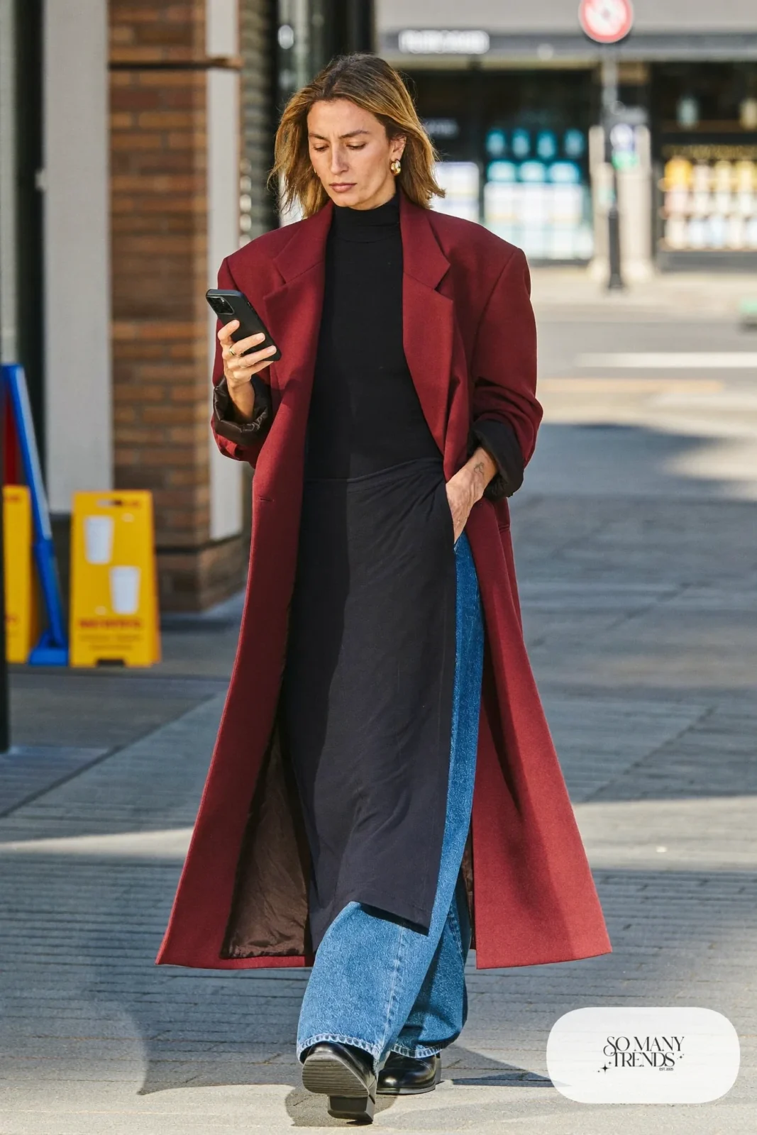 long burgundy blazer black turtleneck wide-leg jeans black ankle boots gold hoop earrings january outfit 7