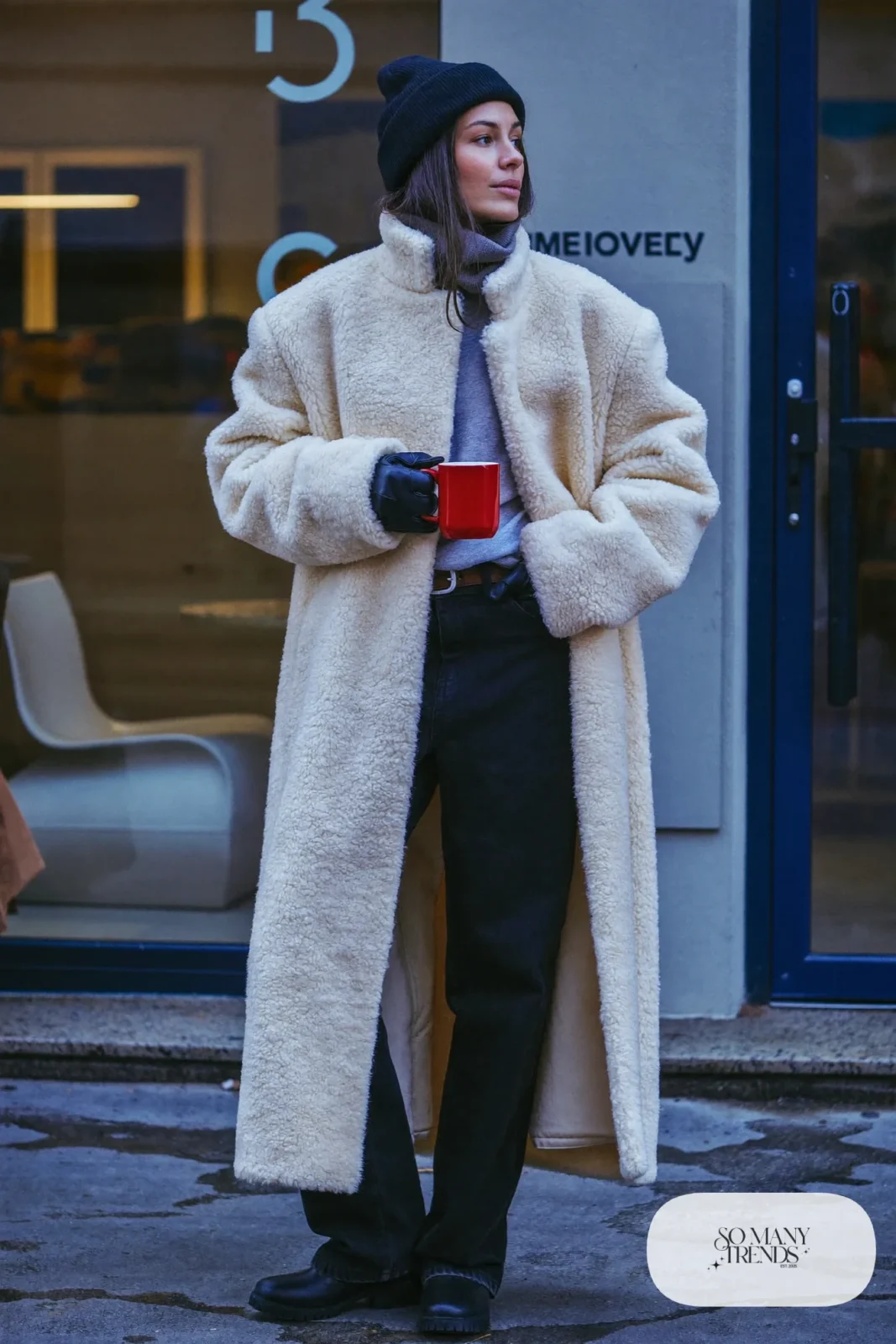 oversized cream teddy coat gray tee black straight jeans black boots red coffee mug january outfit 9