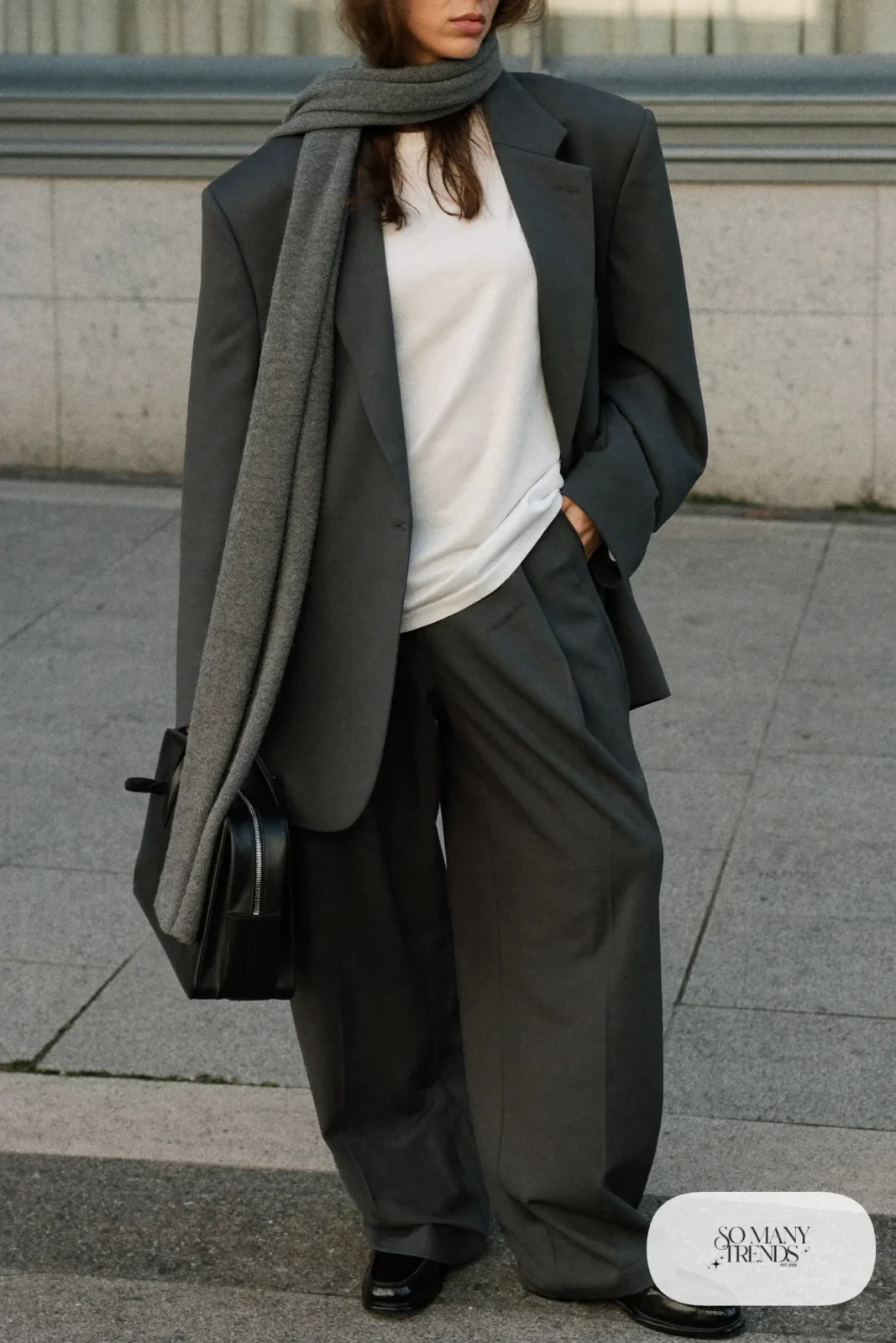 relaxed charcoal blazer charcoal pleated wide-leg wool pants white tee black loafers long gray scarf january outfit 18