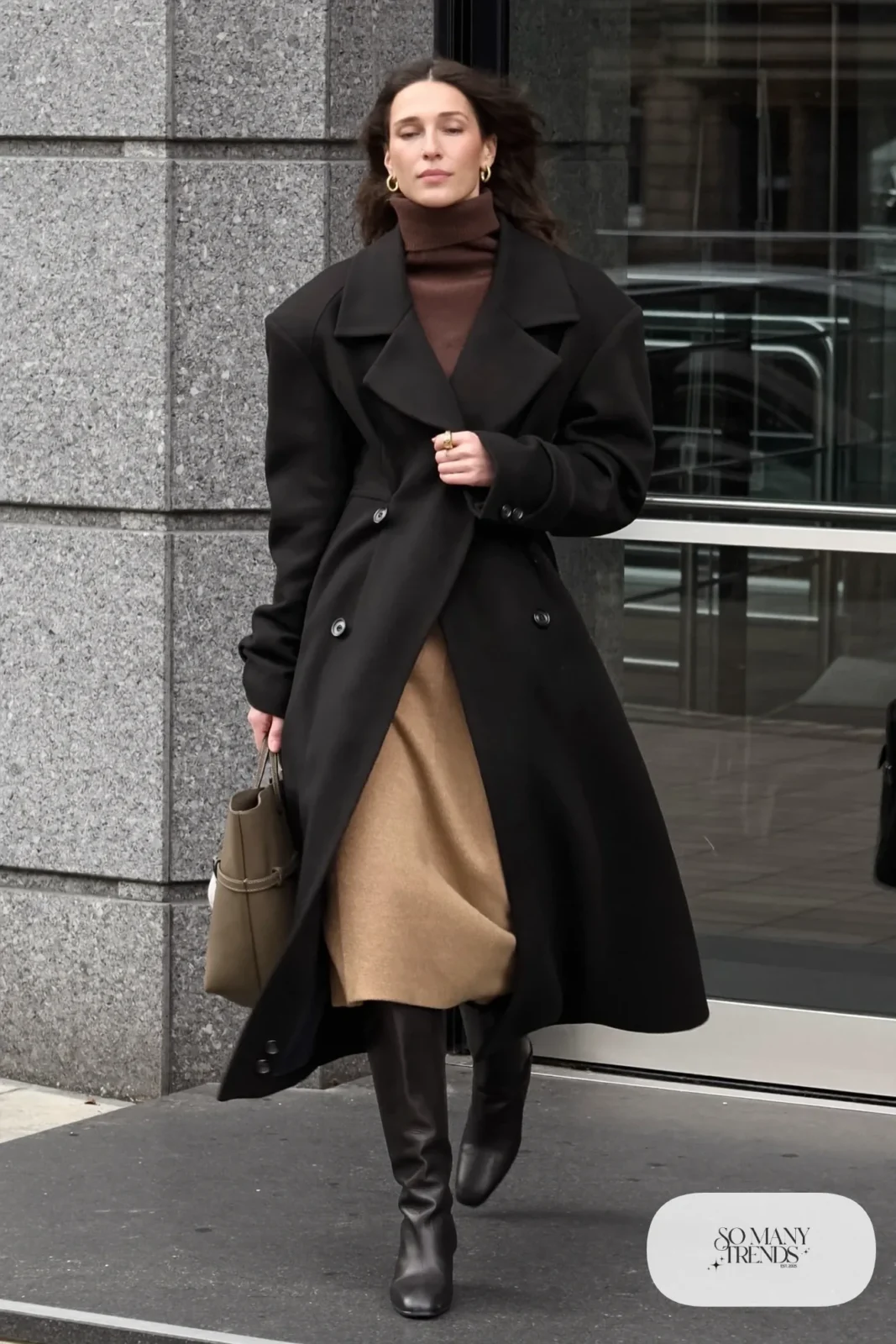 chocolate brown turtleneck camel wool midi skirt tall black boots long black coat gold earrings january outfit 25