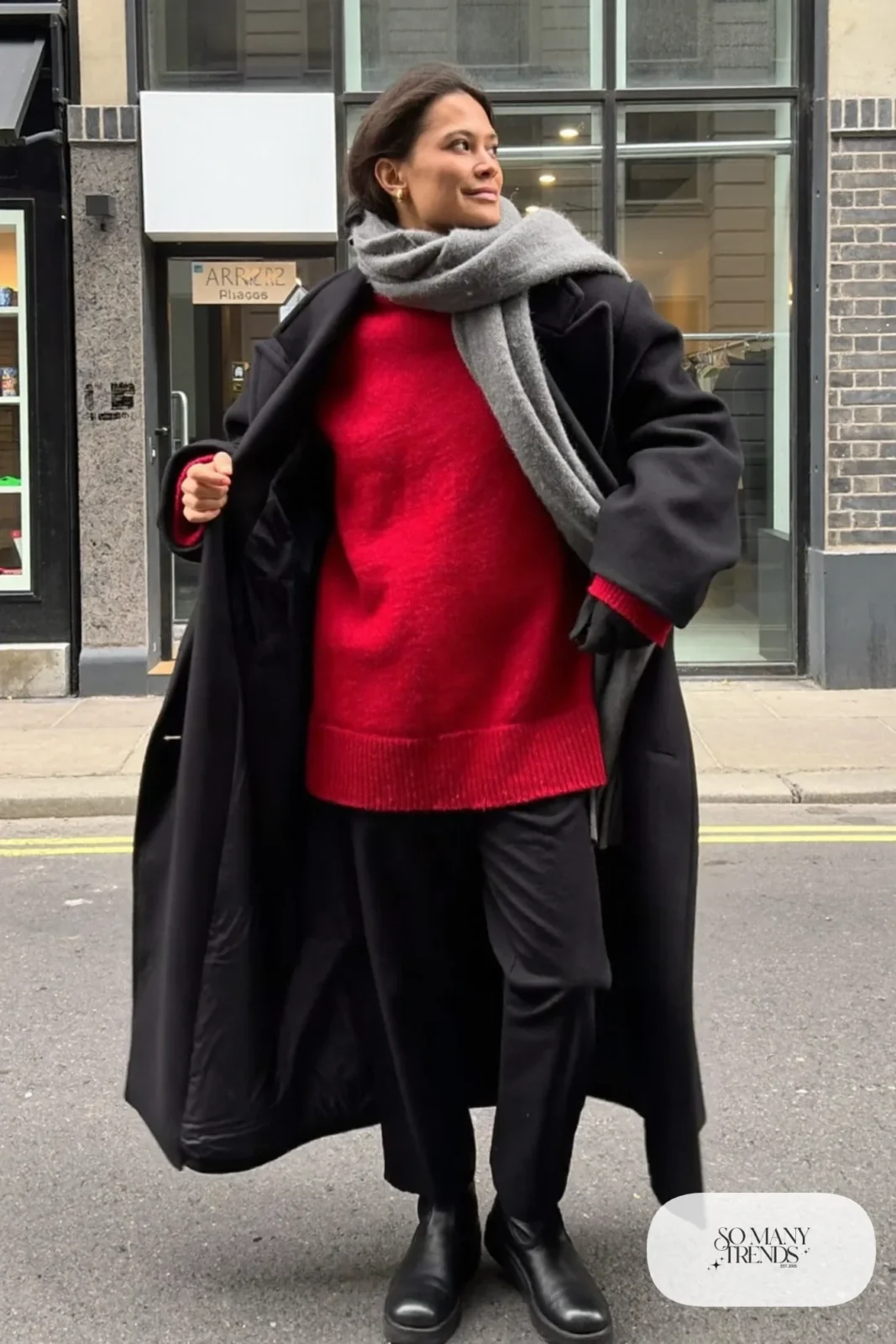 long oversized black wool coat cherry red sweater black straight pants black boots gray scarf january outfit 27