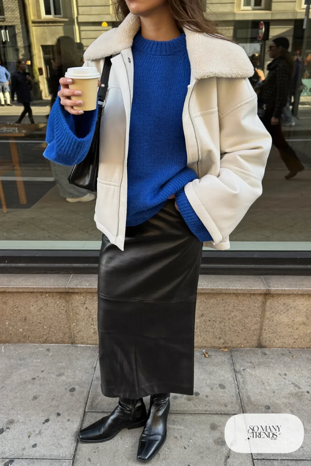 Black leather midi skirt, oversized cobalt sweater, black boots, shearling jacket, winter outfit 24