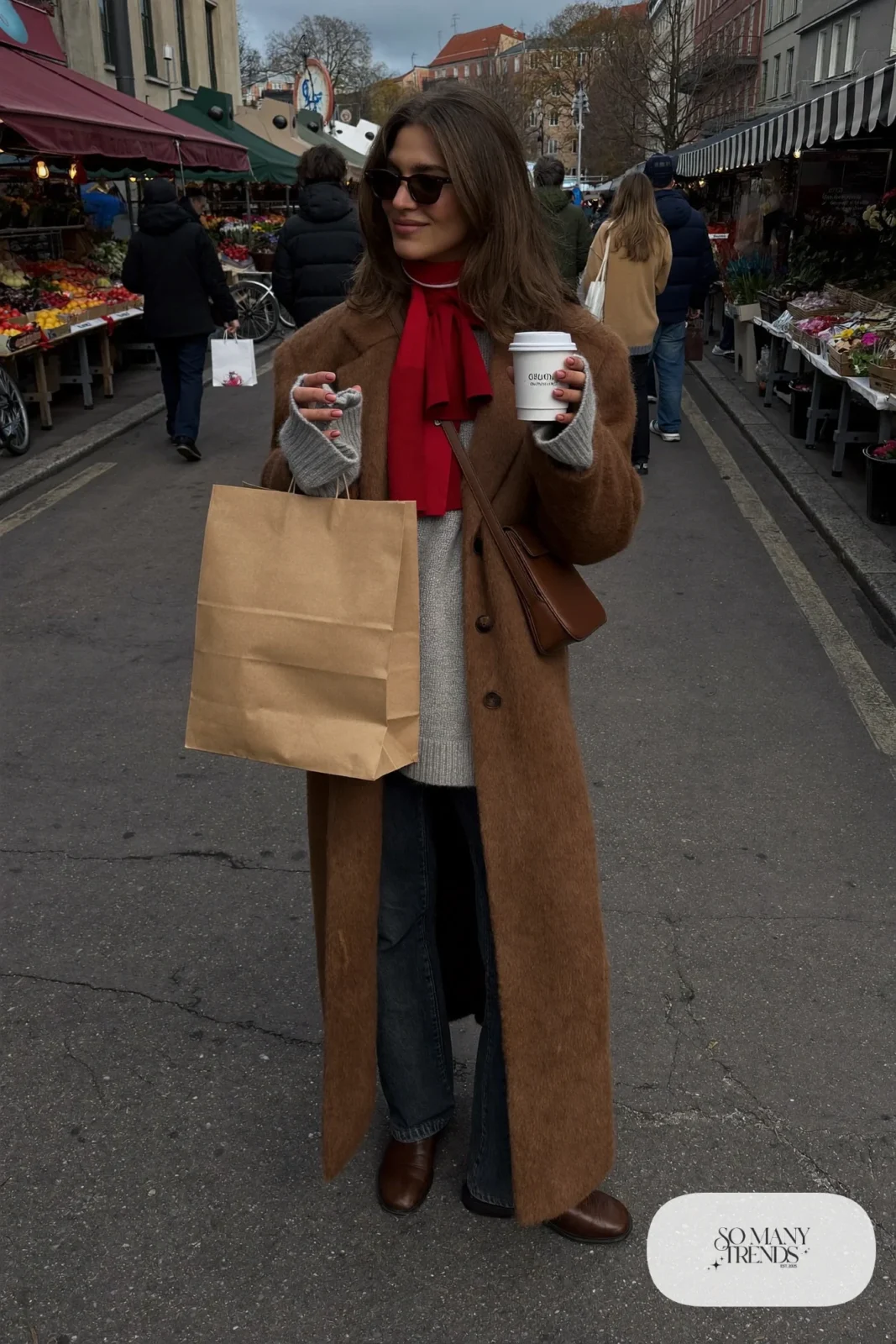 Camel wool coat, gray sweater, dark jeans, cherry red scarf, flat boots, crossbody bag, winter outfit 27
