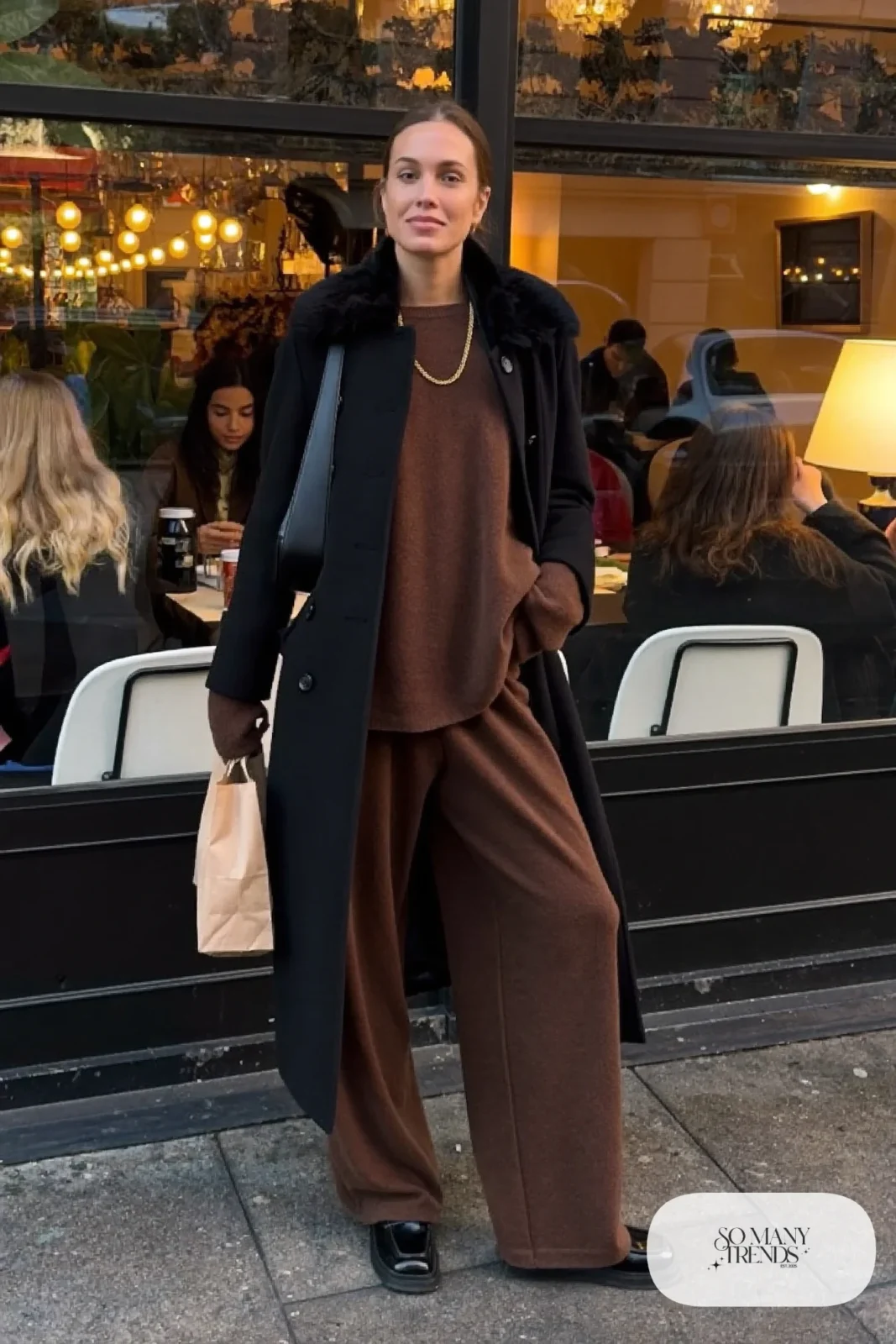 Chocolate brown matching knit set, black coat with faux fur collar, chunky loafers, gold chain, winter outfit 35