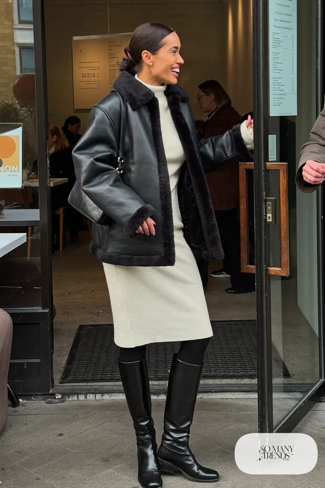 black shearling lined boxy jacket cream ribbed knit midi dress black tall leather boots opaque tights black bag outfit 6