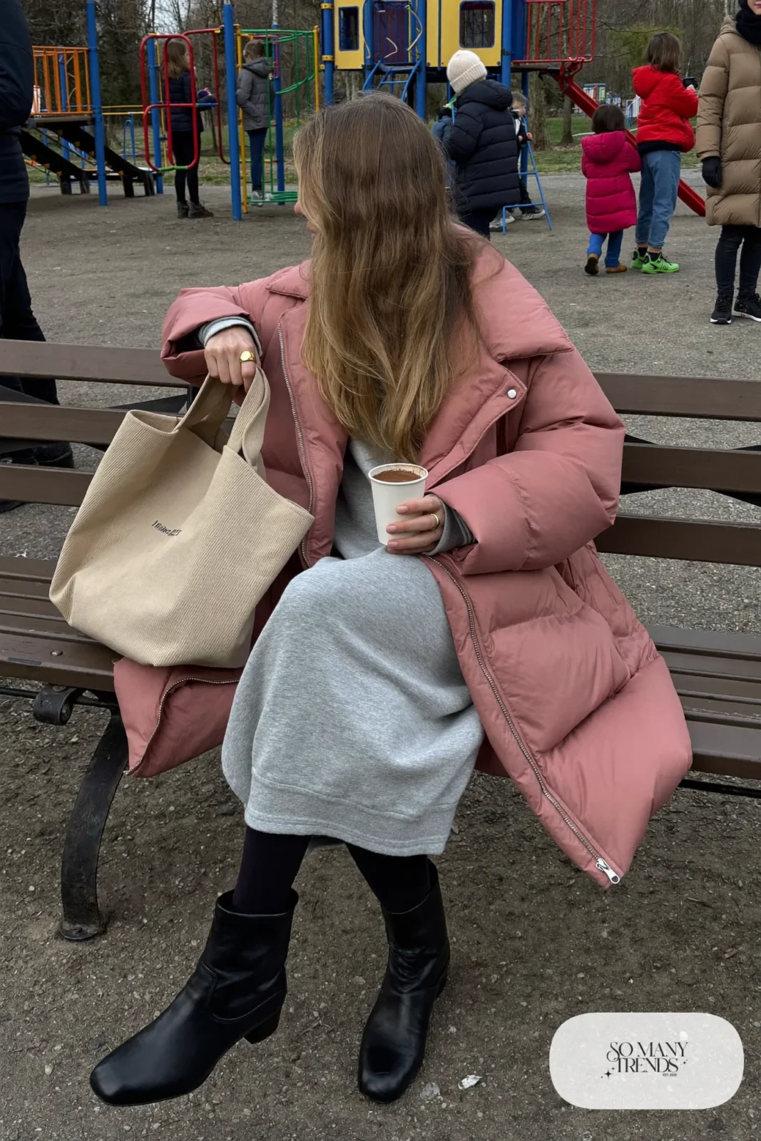dusty pink puffer jacket gray sweatshirt dress thick black tights black ankle boots neutral tote outfit 16
