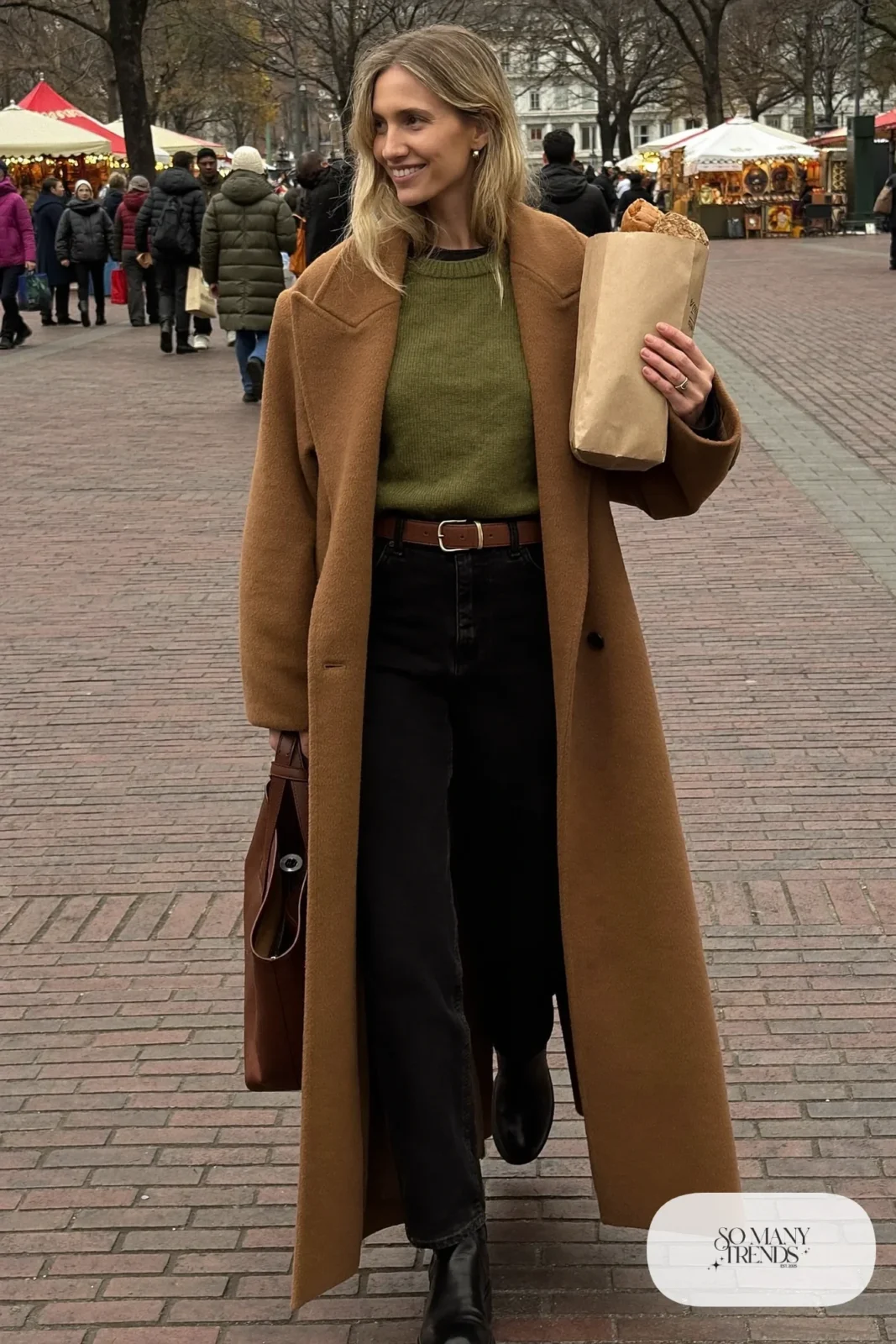 long camel wool coat belted olive green knit sweater black straight jeans black chelsea boots brown leather tote outfit 18